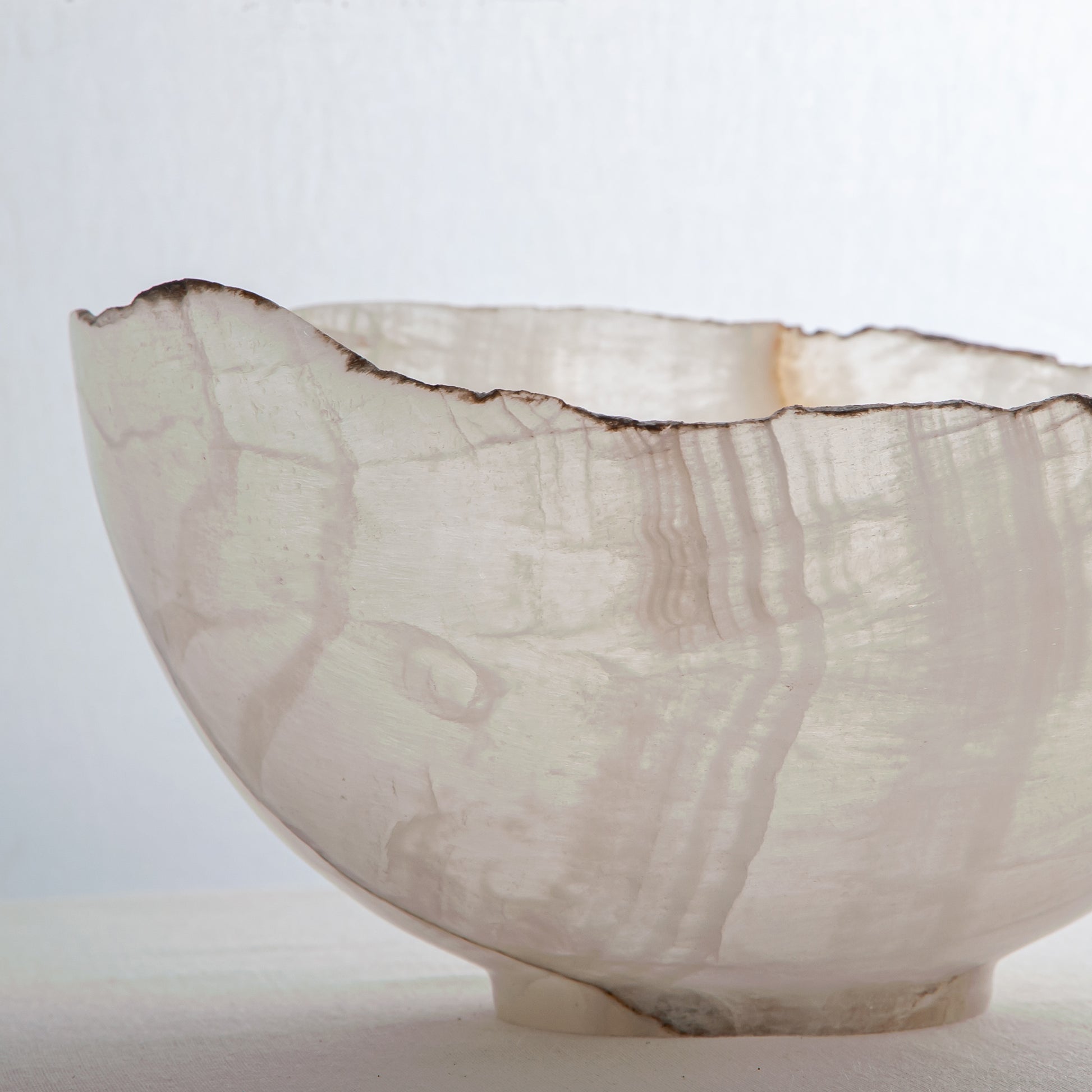 handcrafted onyx bowl with milky translucency and subtle warm veining for luxury decor
