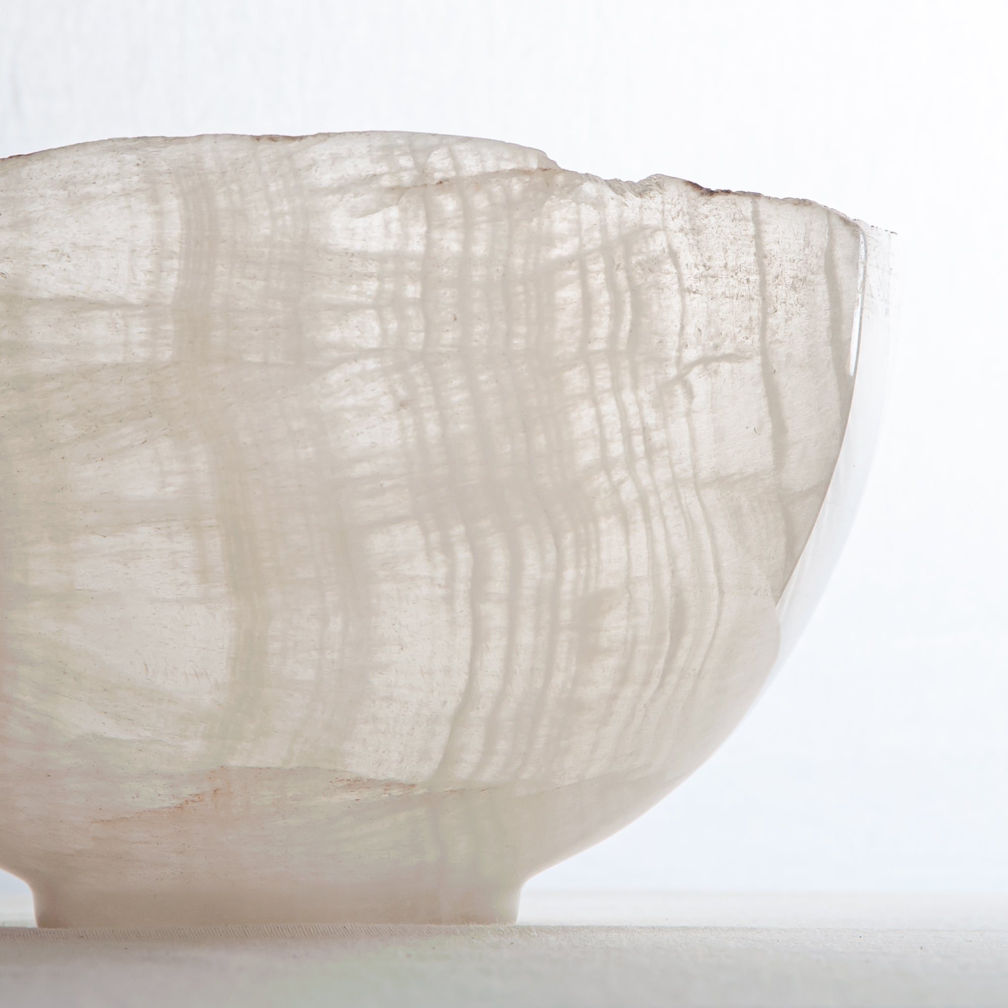 handcrafted onyx bowl with milky translucency and subtle warm veining for luxury decor
