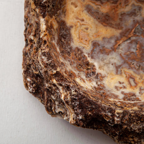 handcrafted onyx bowl with layered amber and ivory veining for luxury table decor
