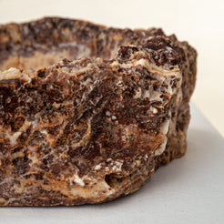 handcrafted onyx bowl with layered amber and ivory veining for luxury table decor
