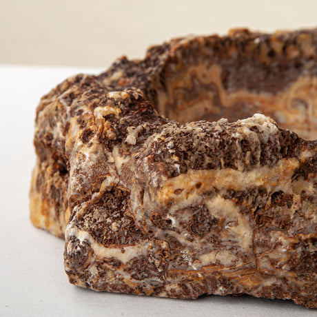 handcrafted onyx bowl with layered amber and ivory veining for luxury table decor
