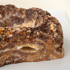 handcrafted onyx bowl with layered amber and ivory veining for luxury table decor
