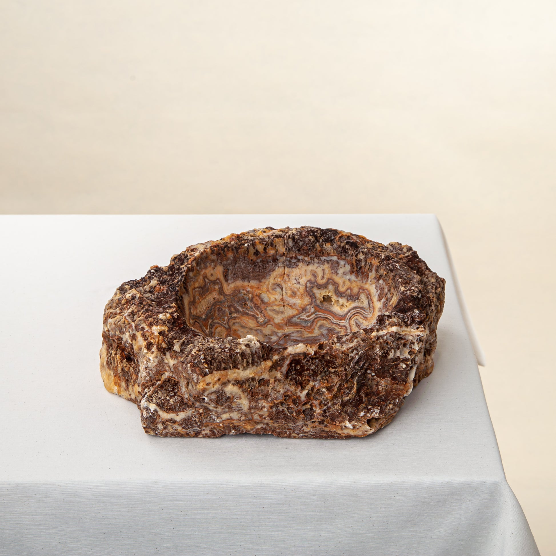 handcrafted onyx bowl with layered amber and ivory veining for luxury table decor
