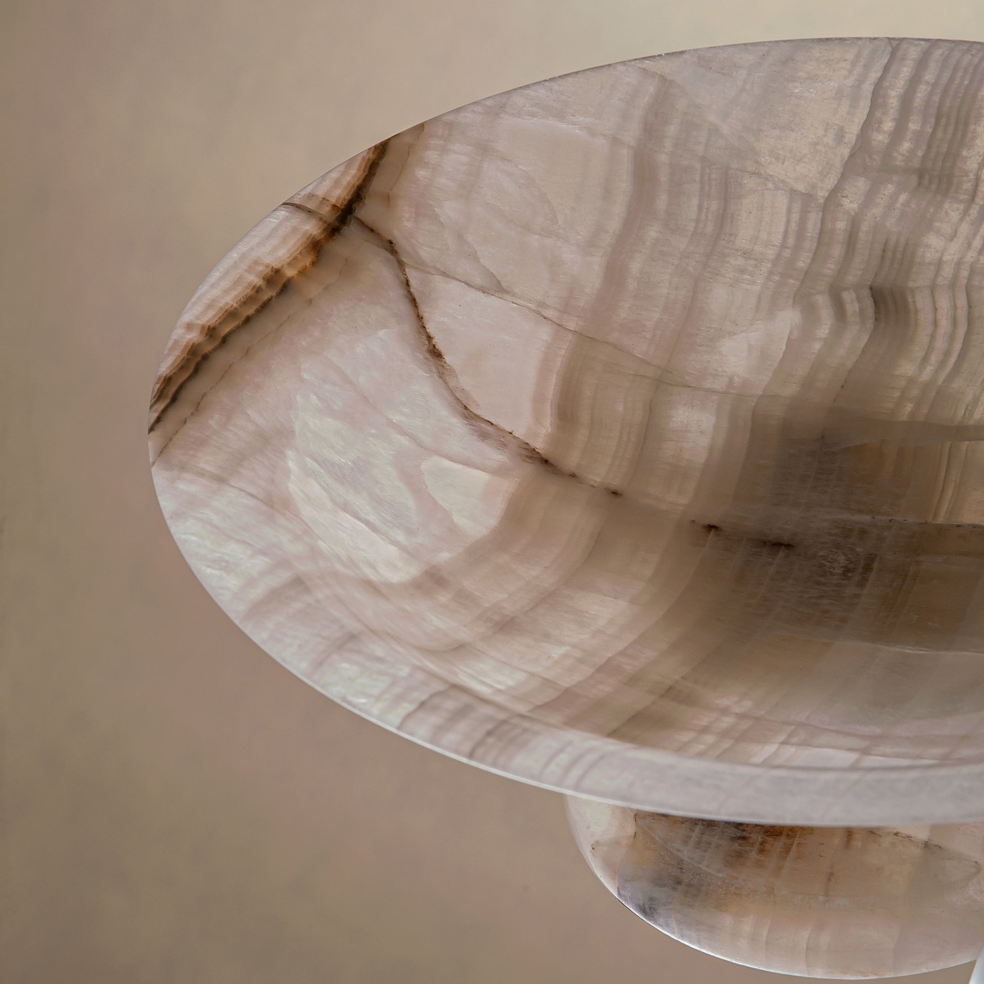 handcrafted onyx bowl with neutral translucency and beige grey veining for luxury decor
