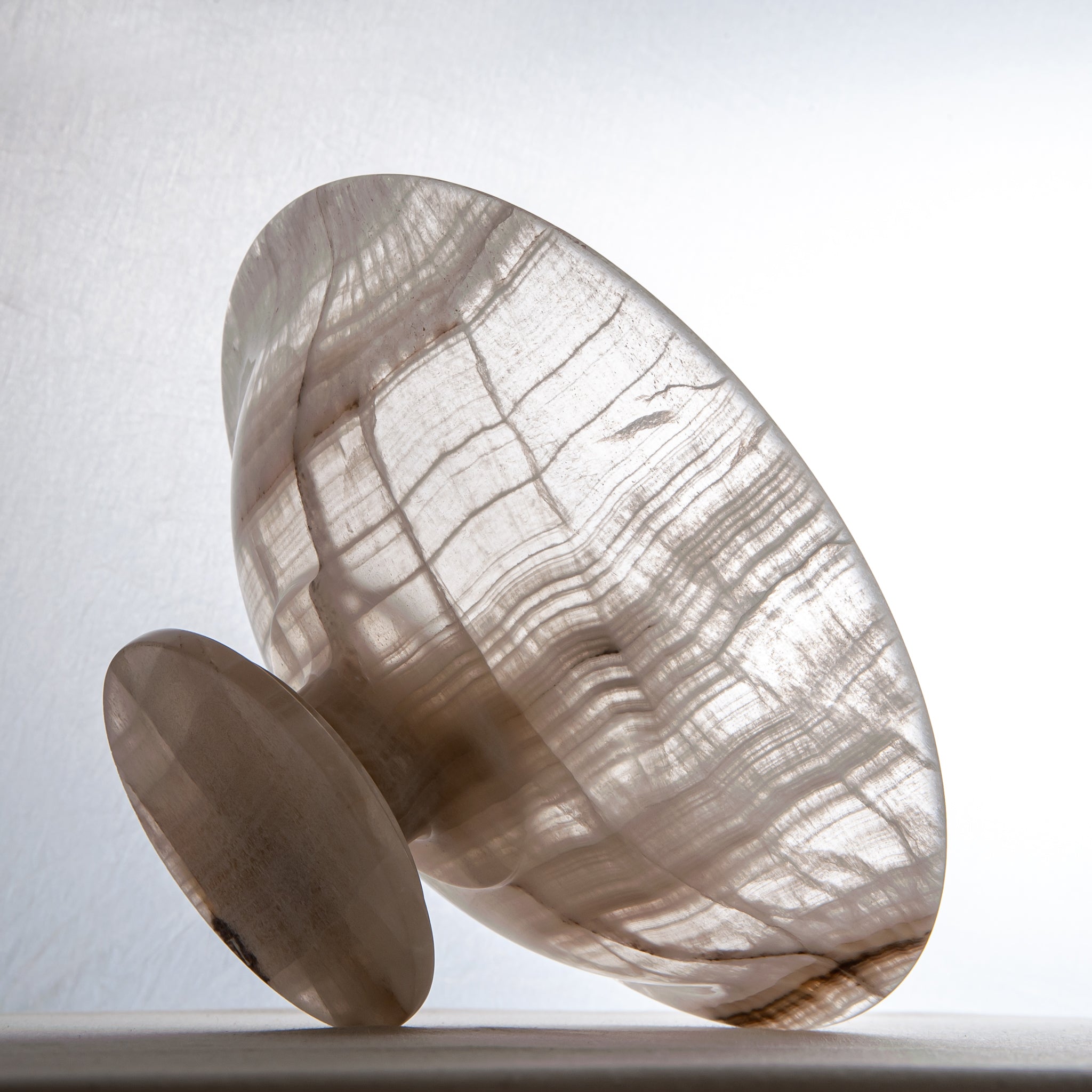 handcrafted onyx bowl with neutral translucency and beige grey veining for luxury decor
