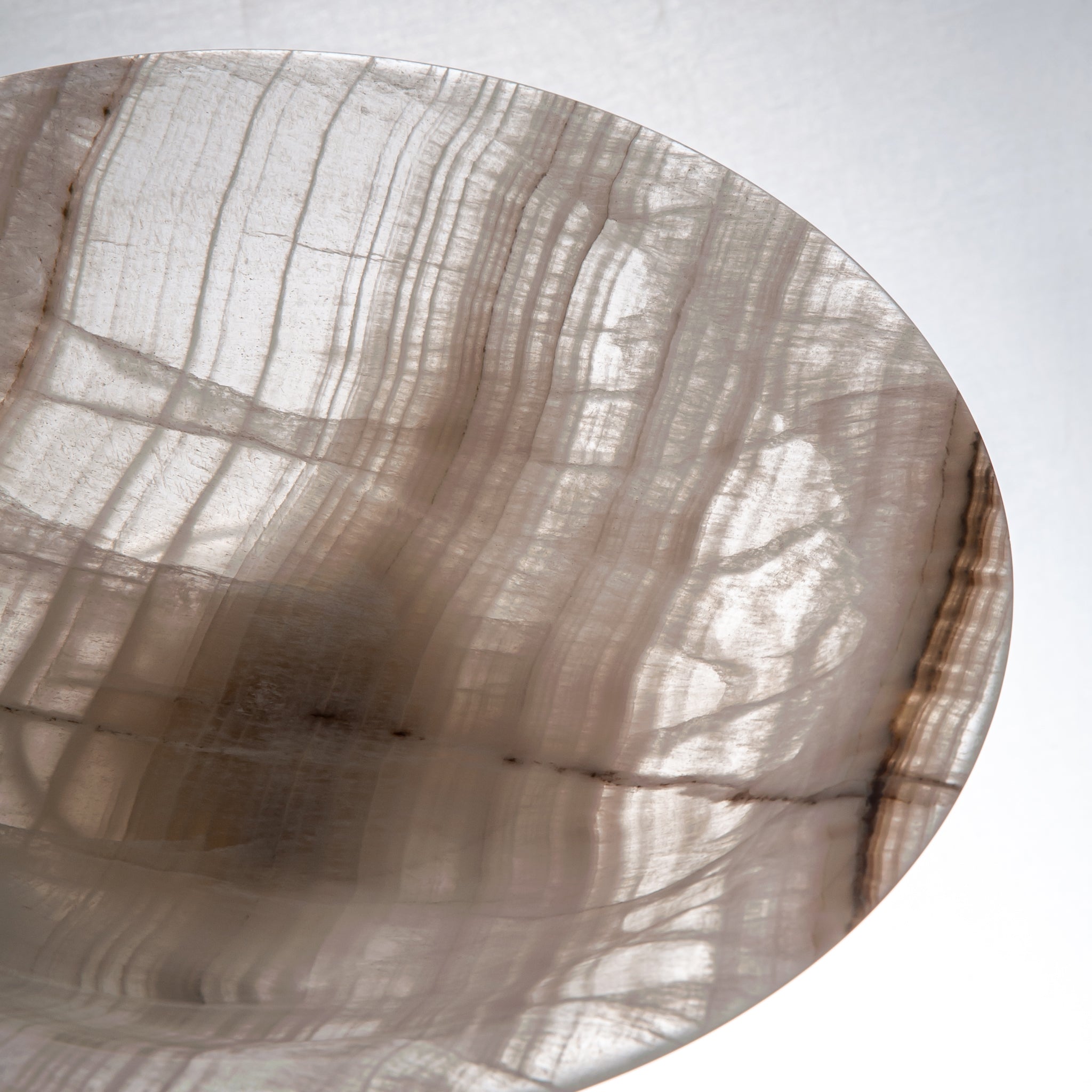 handcrafted onyx bowl with neutral translucency and beige grey veining for luxury decor
