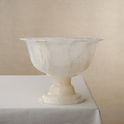 handcrafted onyx bowl with pedestal base and translucent ivory tones for luxury centerpiece decor
