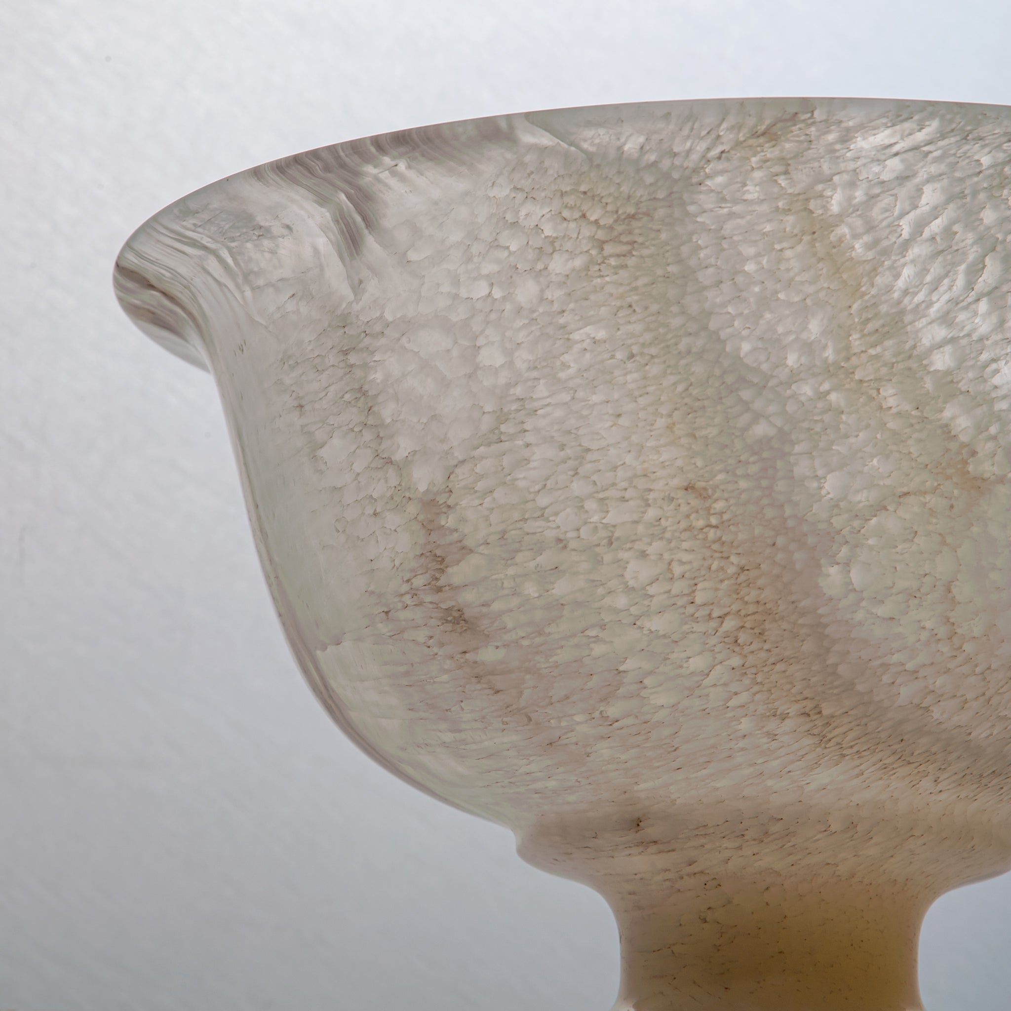 handcrafted onyx bowl with pedestal base and translucent ivory tones for luxury centerpiece decor
