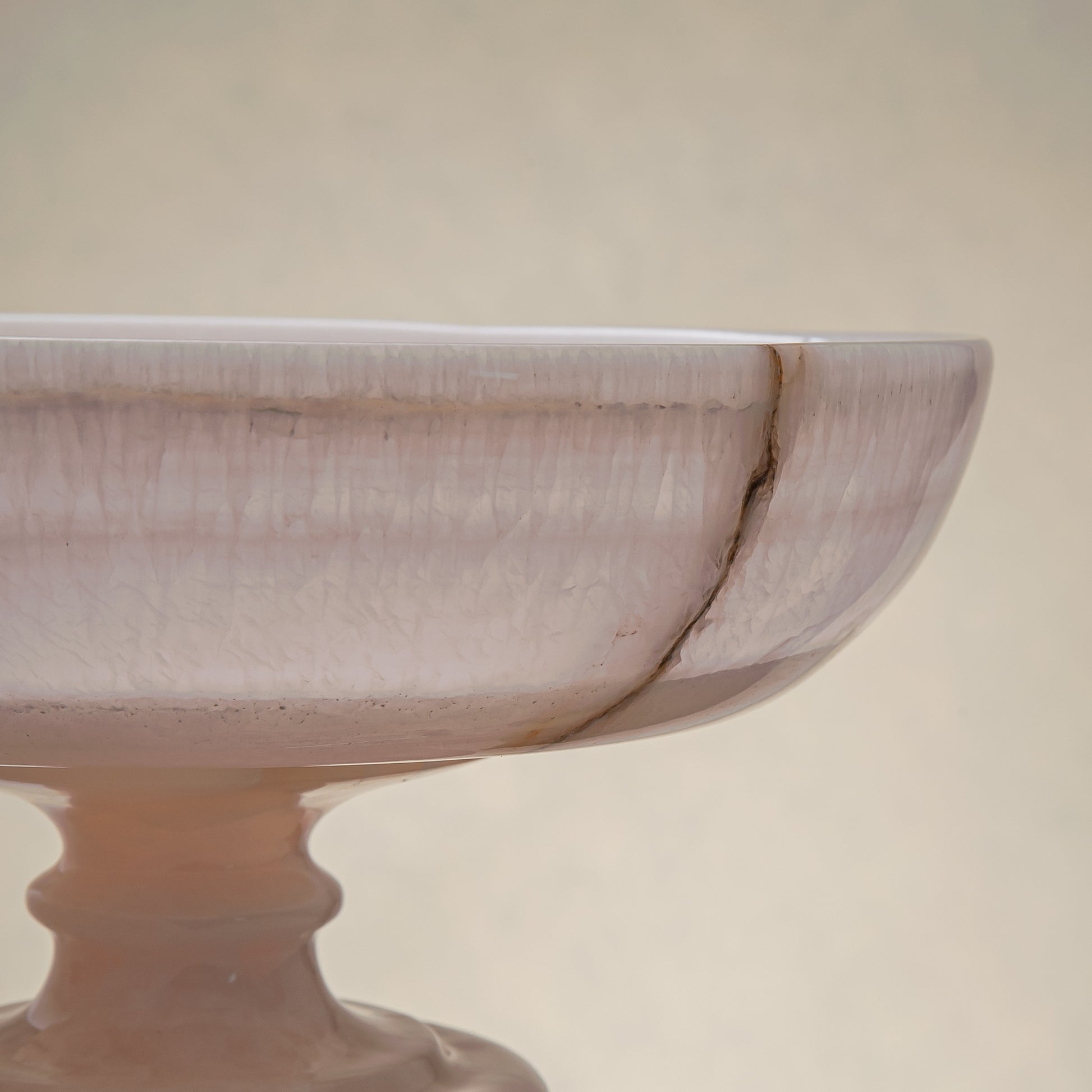 handcrafted onyx bowl with pedestal base milky white translucent stone and natural veining for centerpiece
