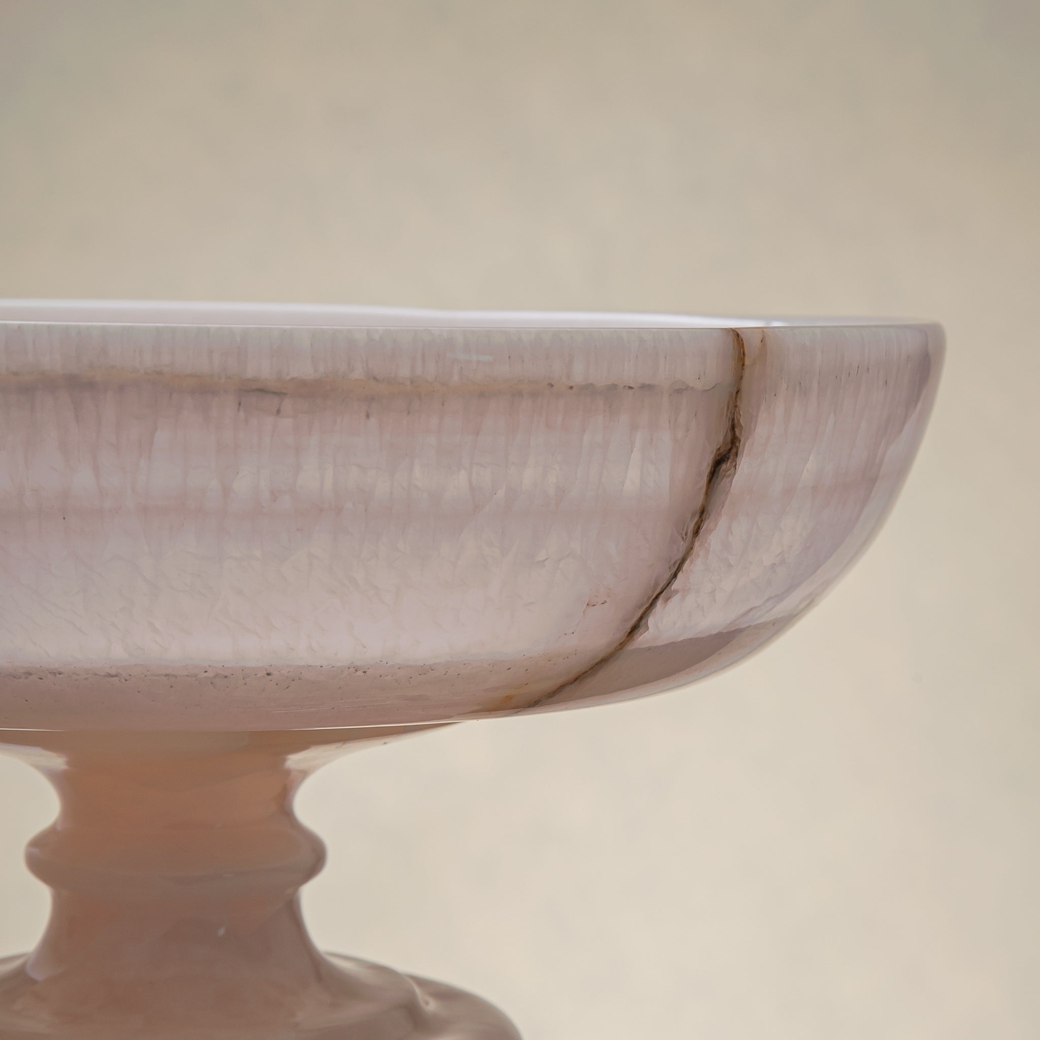 handcrafted onyx bowl with pedestal base milky white translucent stone and natural veining for centerpiece
