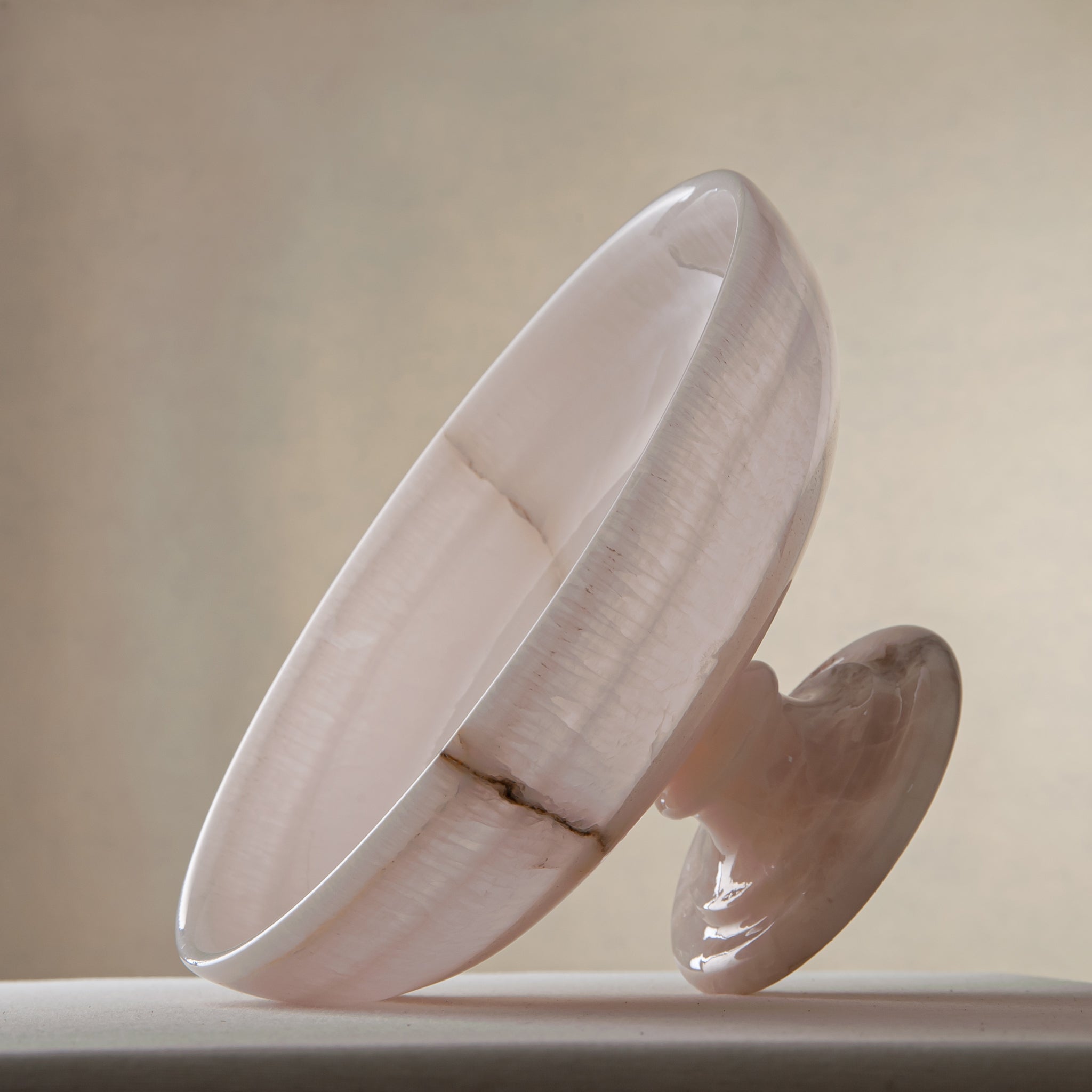 handcrafted onyx bowl with pedestal base milky white translucent stone and natural veining for centerpiece
