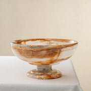 unique natural onyx bowl with irregular rim and warm honey tones as elegant centerpiece

