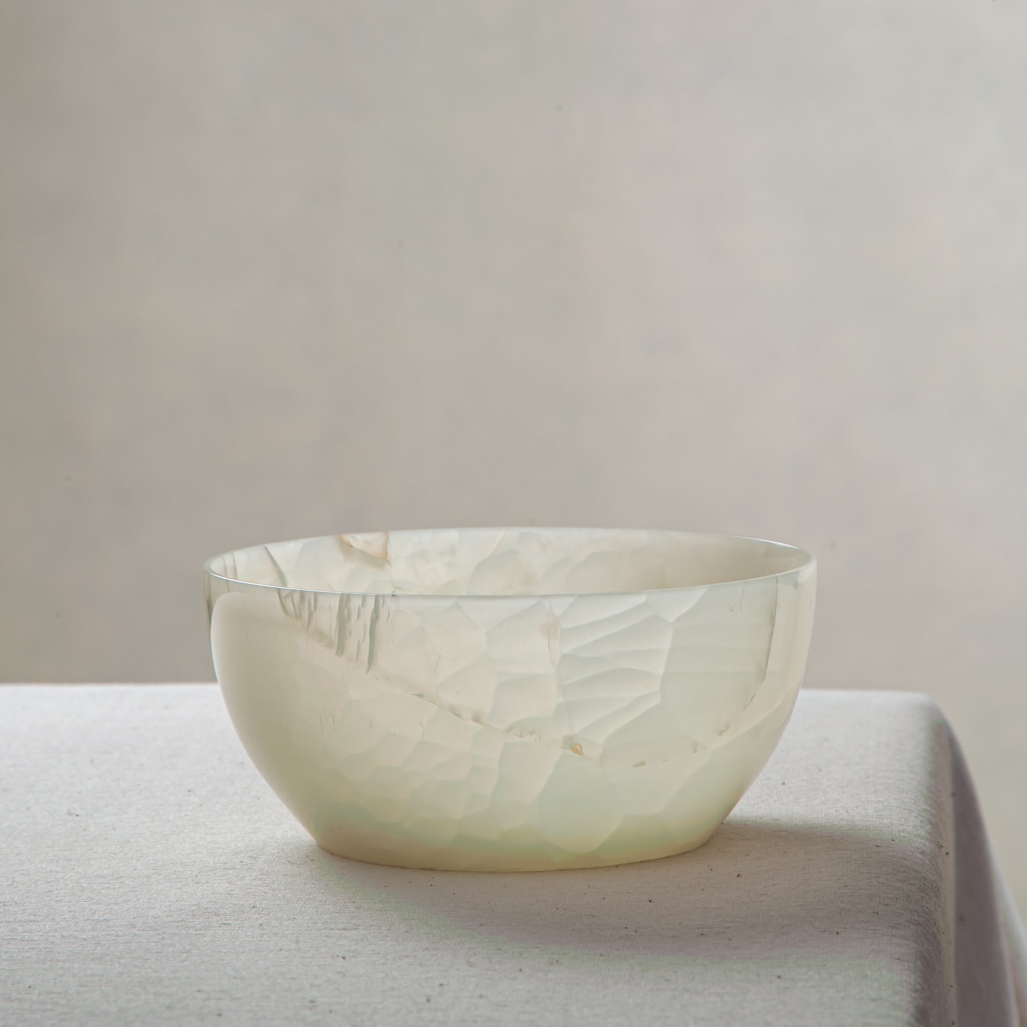 handcrafted onyx bowl with translucent milky texture and smooth rounded form for modern decor
