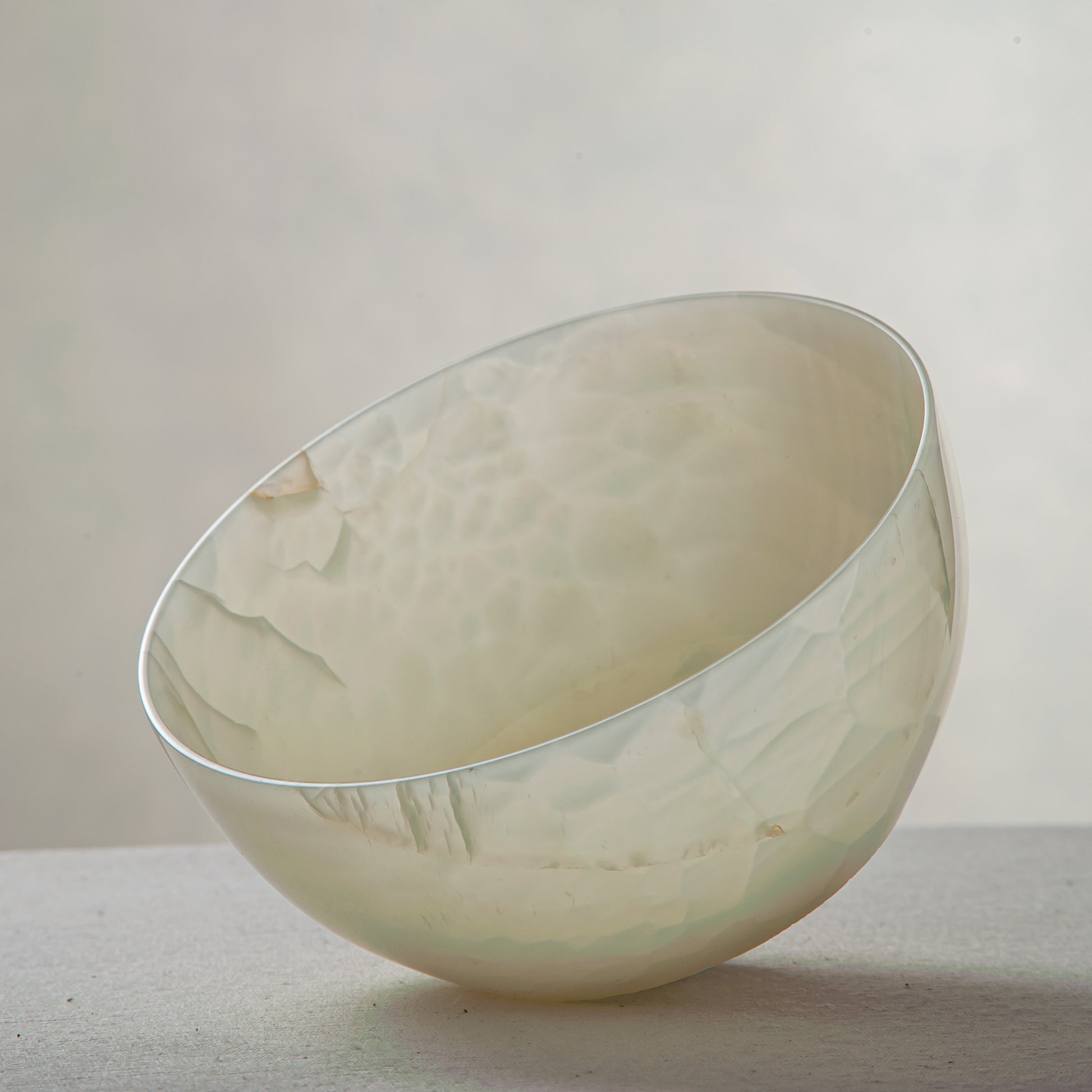 handcrafted onyx bowl with translucent milky texture and smooth rounded form for modern decor
