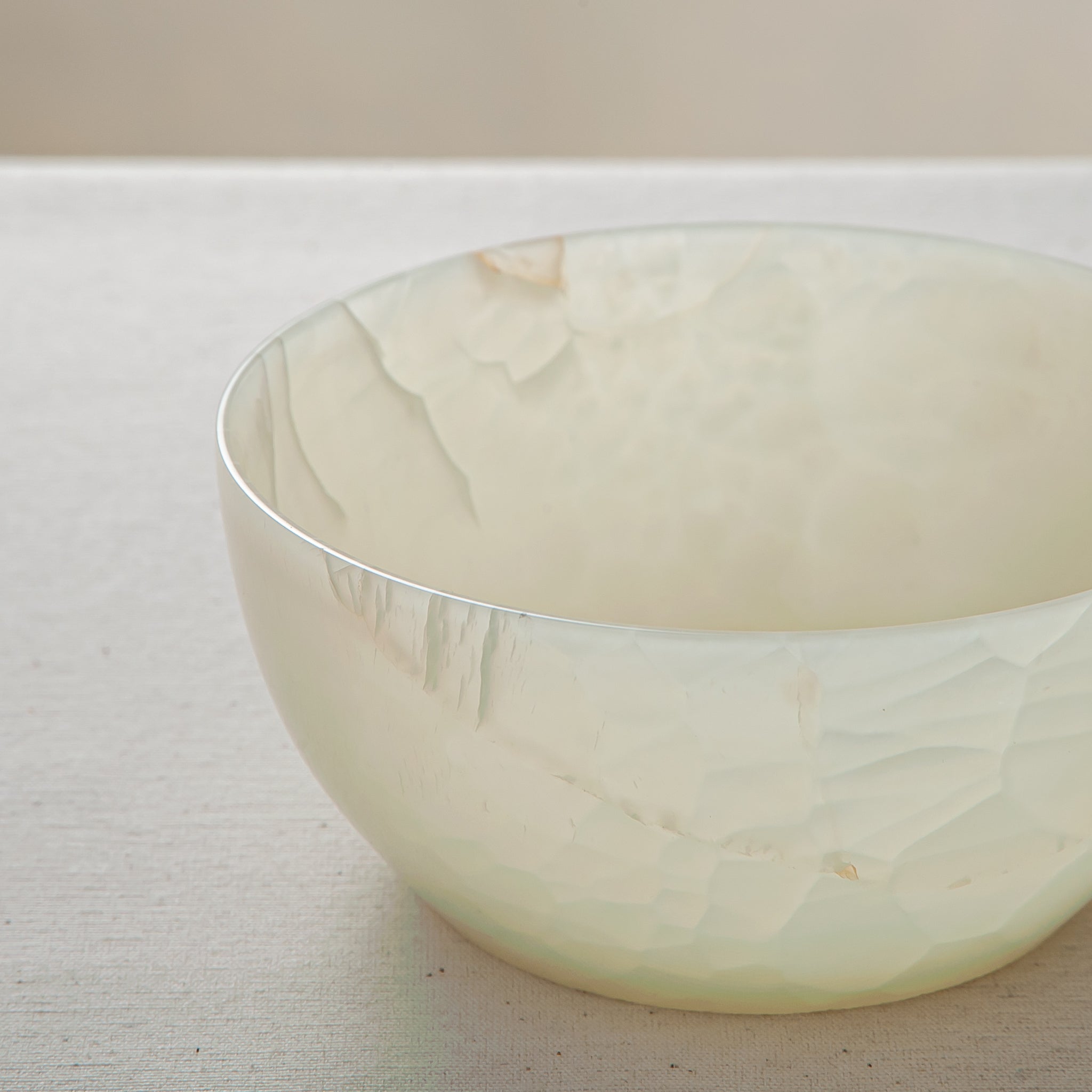 handcrafted onyx bowl with translucent milky texture and smooth rounded form for modern decor
