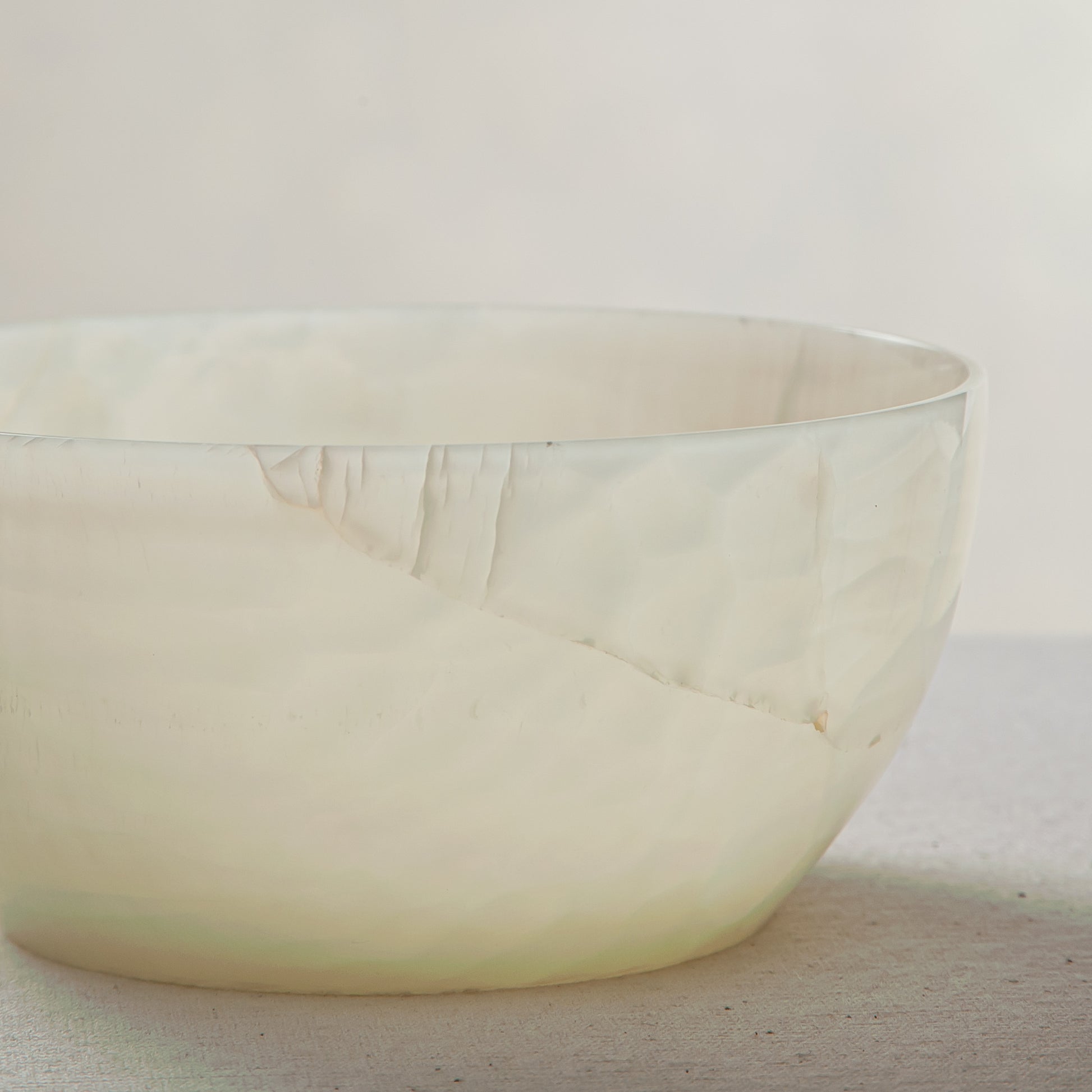 handcrafted onyx bowl with translucent milky texture and smooth rounded form for modern decor
