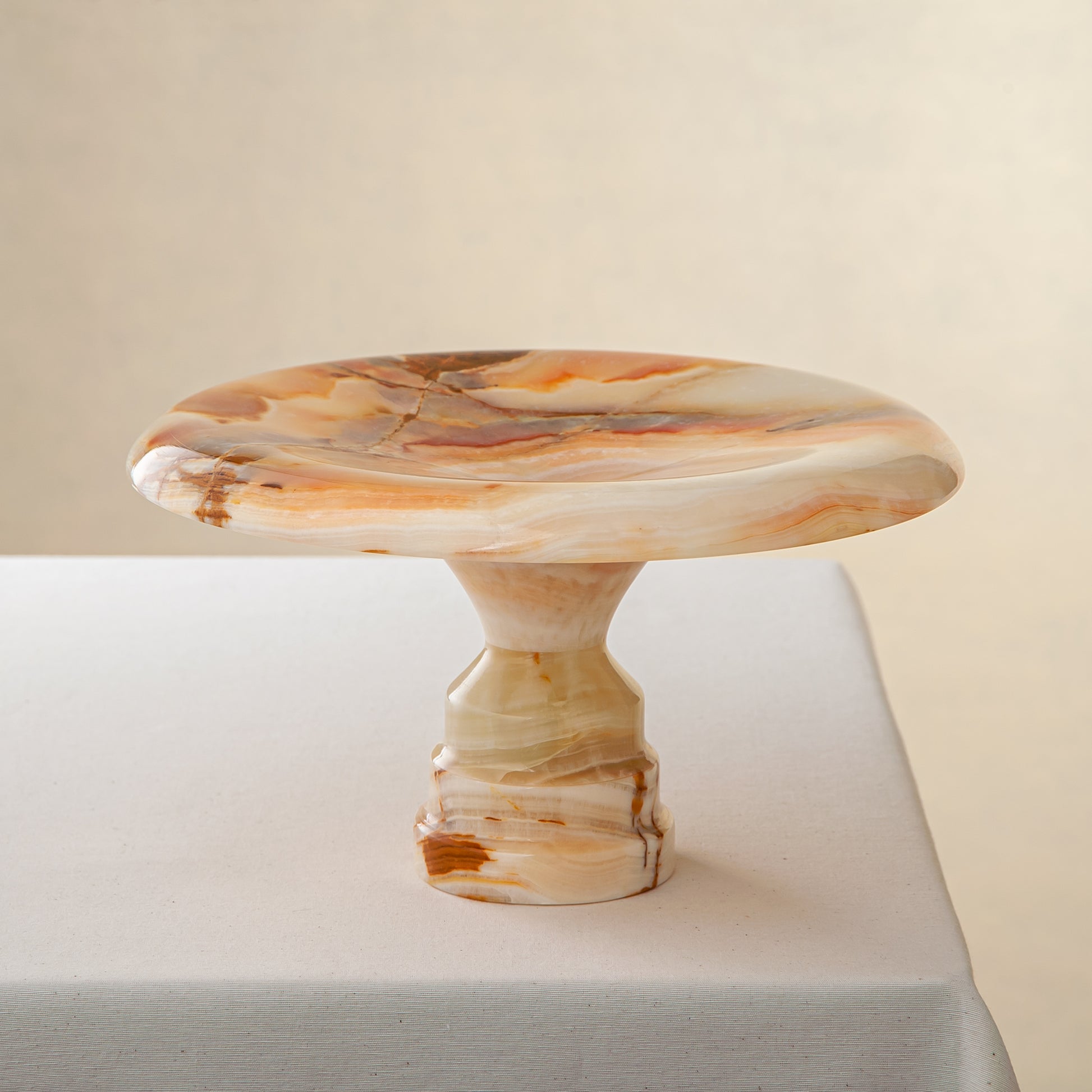 handcrafted onyx cake stand ivory stone with amber veining luxury centerpiece
