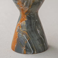 handcrafted onyx candle holder with green grey tones and amber veining for ambient decor