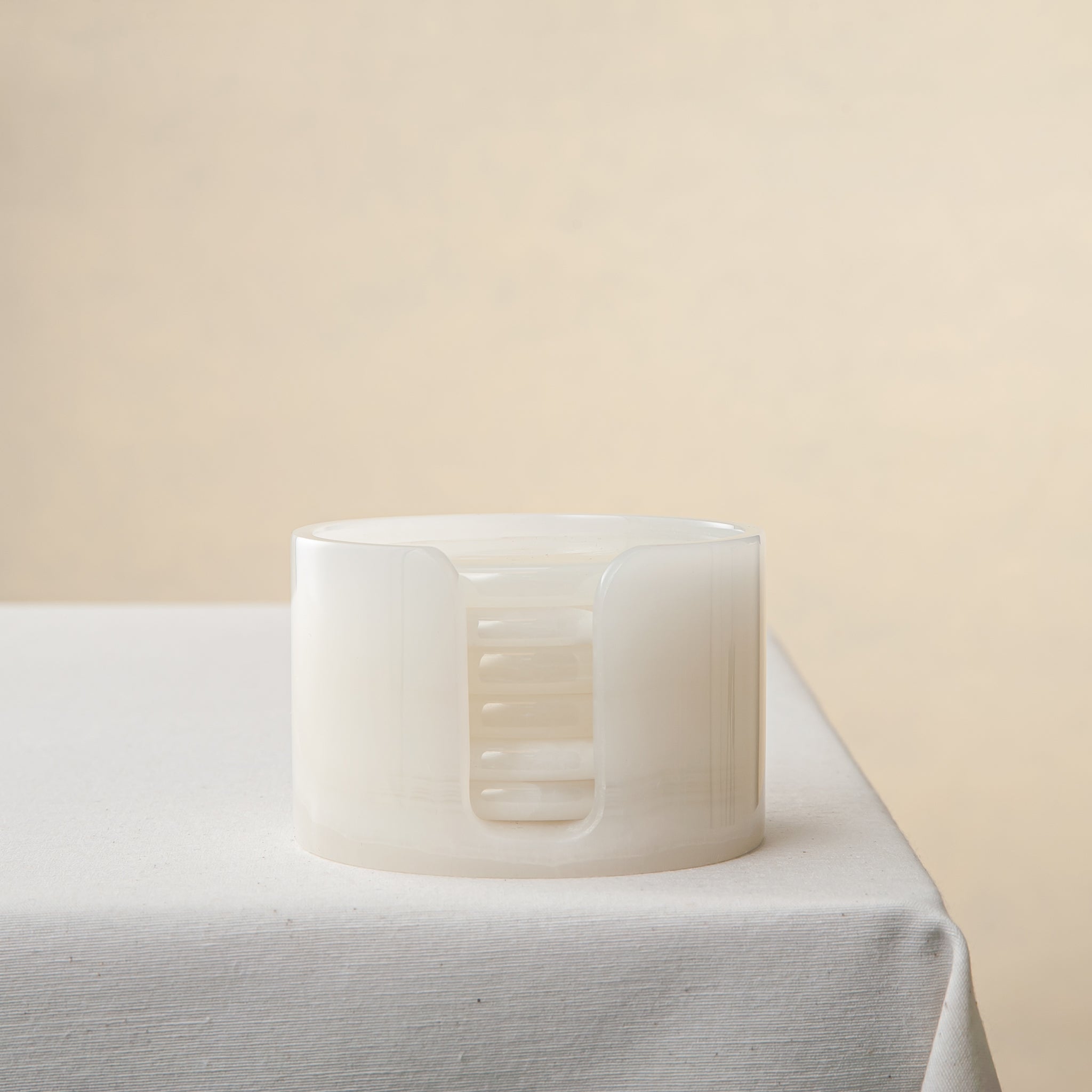 unique onyx coasters set translucent white stone handcrafted sculptural design table setting
