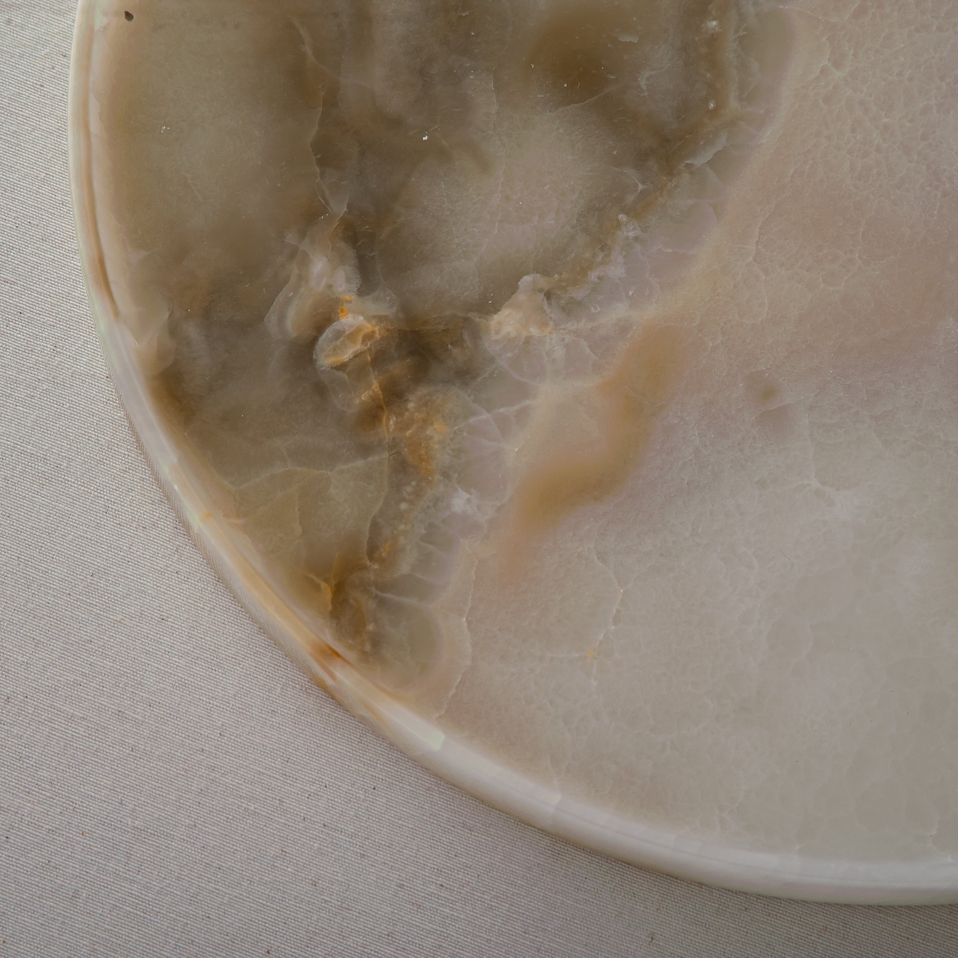 Unique onyx plate with translucent ivory tones and natural flowing veining
