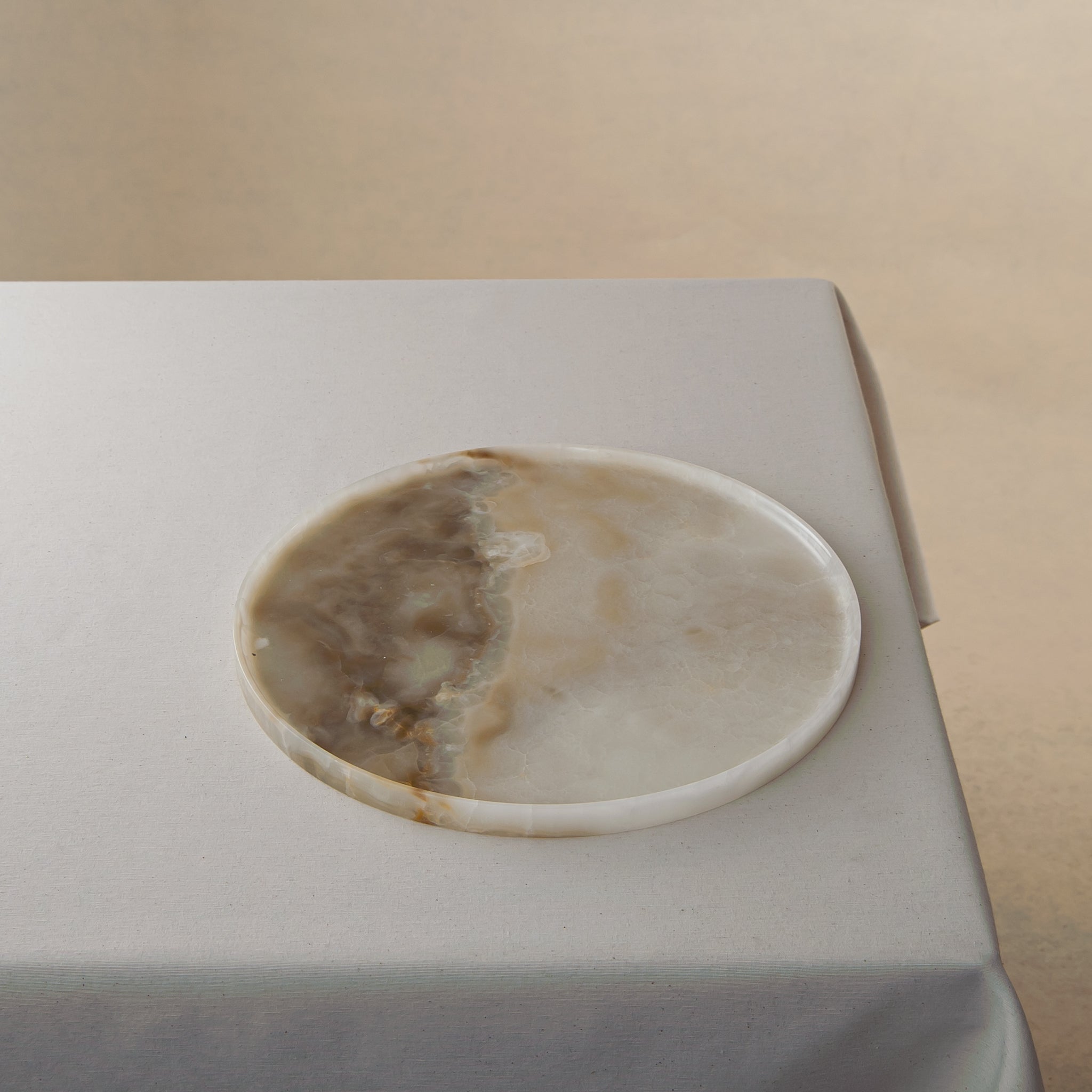Unique onyx plate with translucent ivory tones and natural flowing veining
