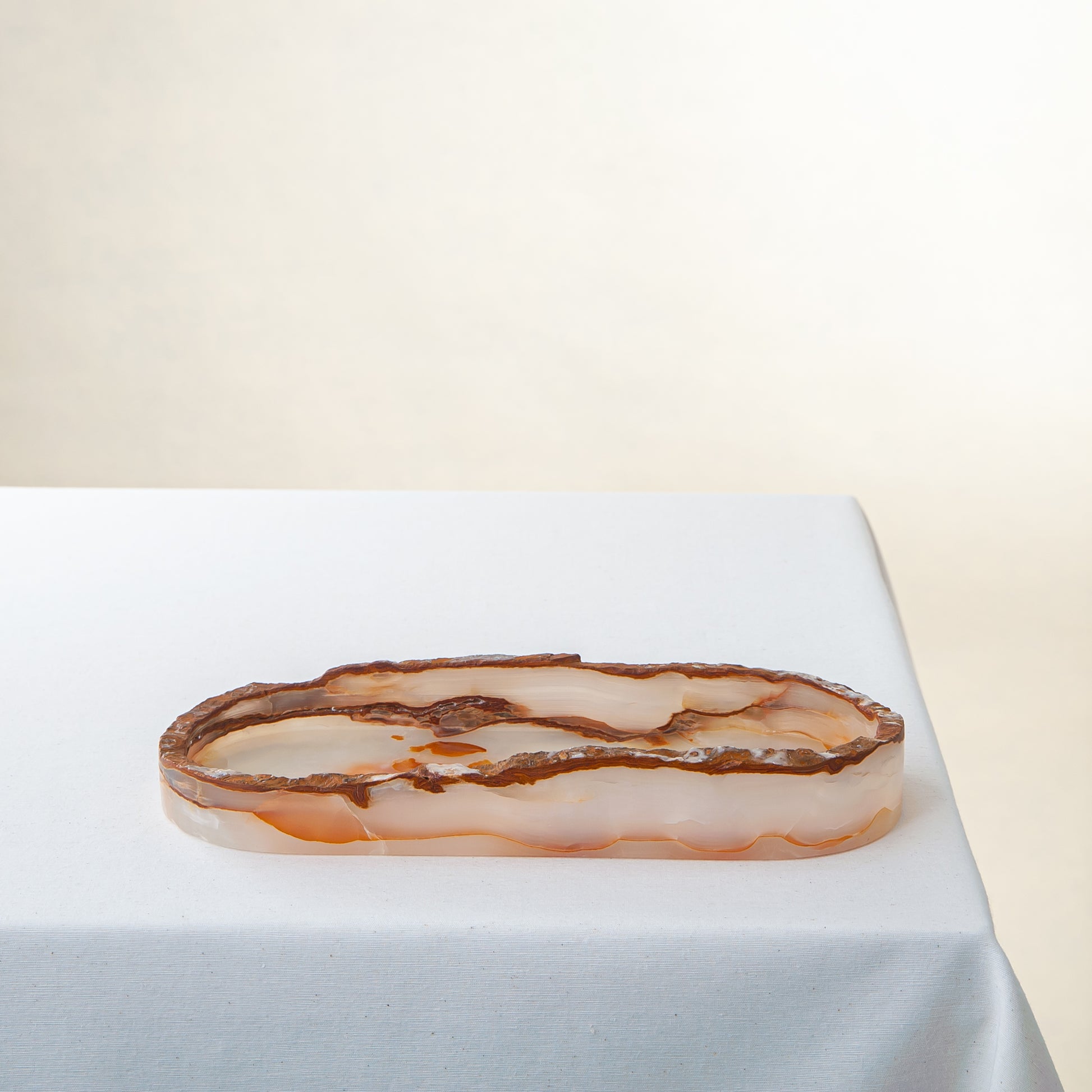 Handcrafted onyx tray with translucent amber veining unique decorative piece
