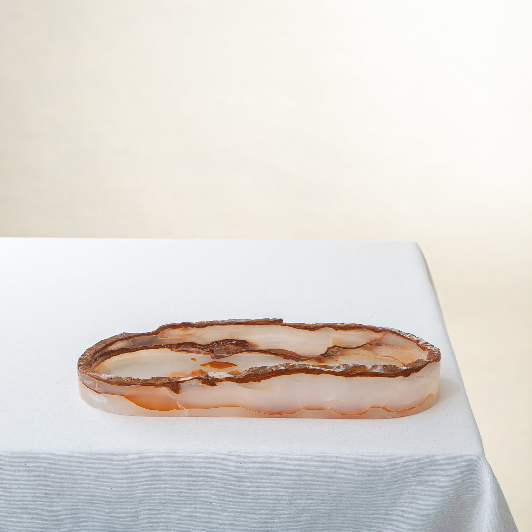 Handcrafted onyx tray with translucent amber veining unique decorative piece
