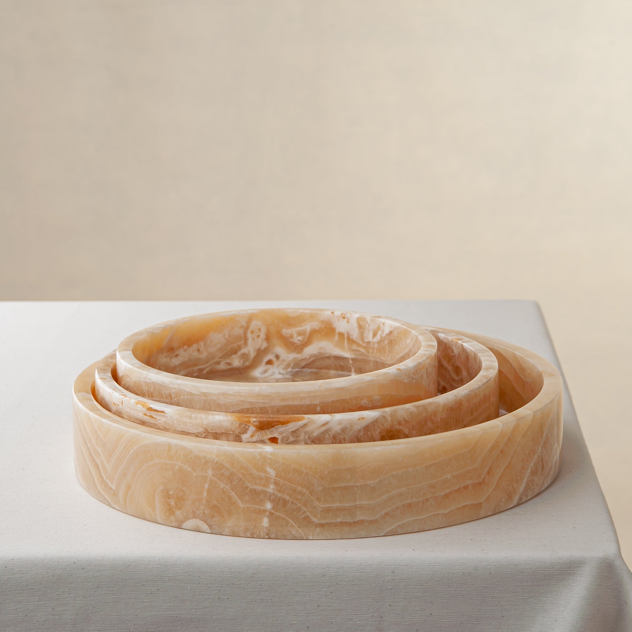 handcrafted onyx tray set warm honey stone layered veining luxury decor
