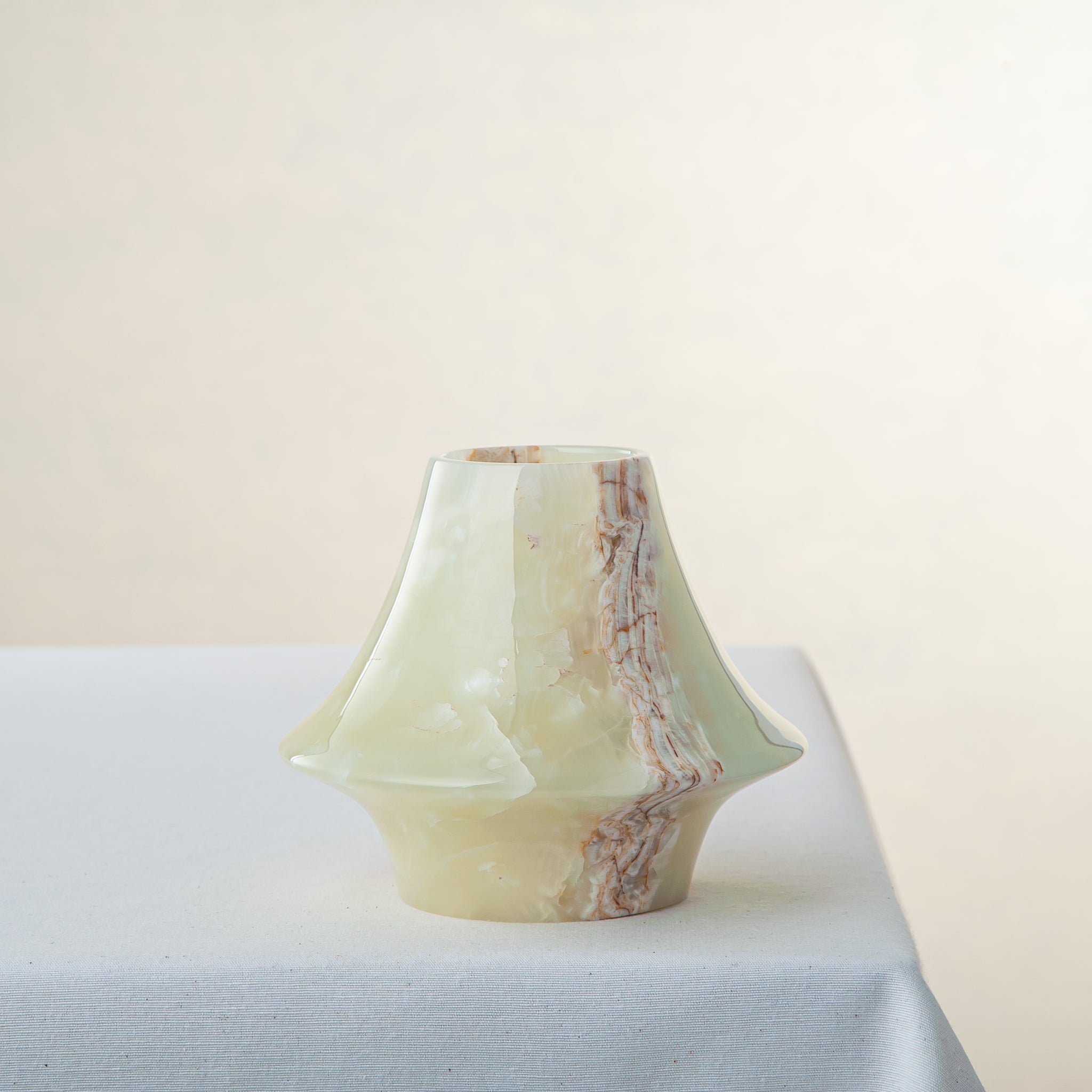 handcrafted onyx vase translucent green with amber veining luxury centerpiece
