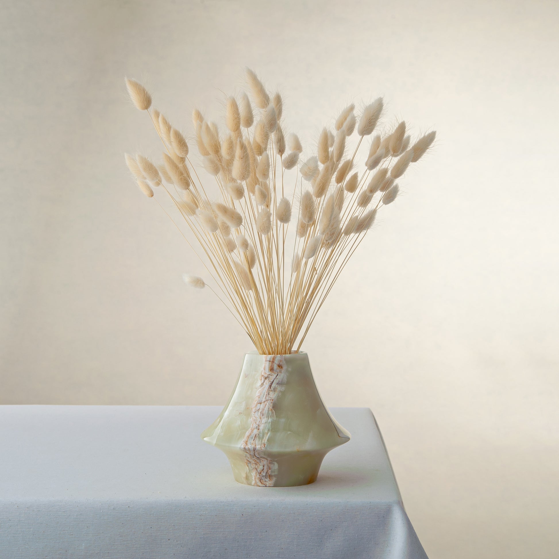 handcrafted onyx vase translucent green with amber veining luxury centerpiece
