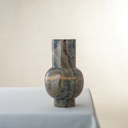 Handcrafted onyx vase with deep green tones and rust veining for luxury interior decor
