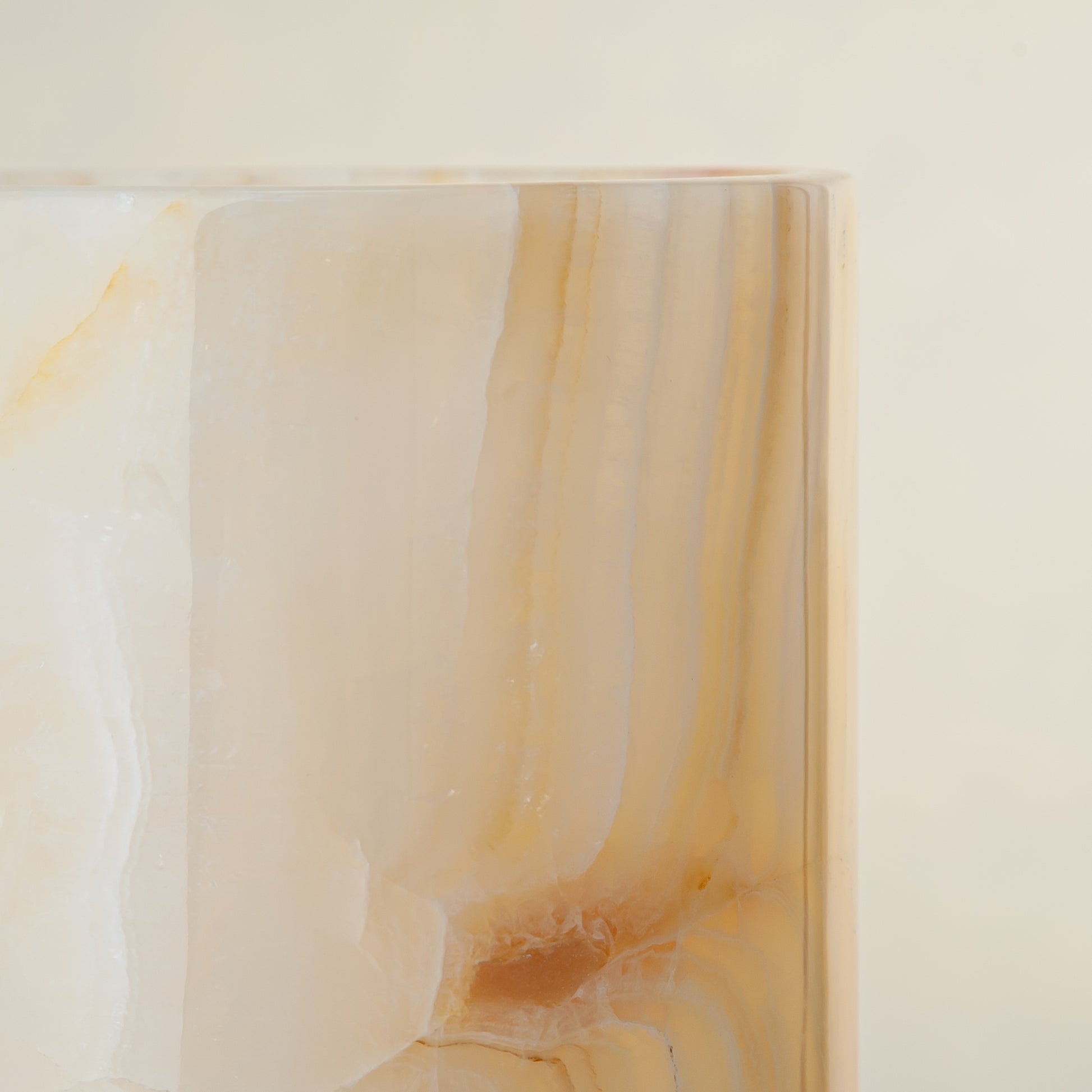 handcrafted onyx vase with honey and amber veining for elegant interior decor
