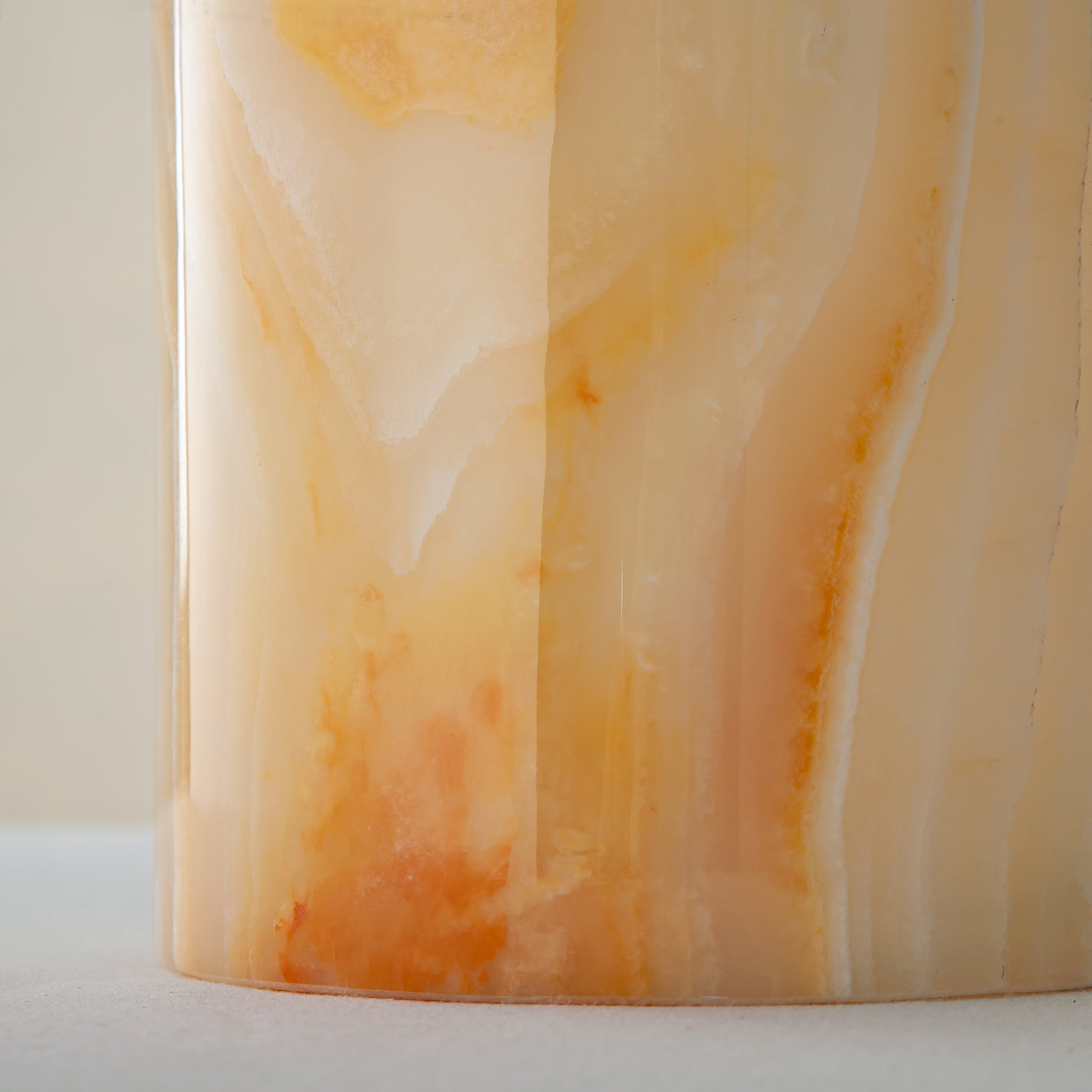 handcrafted onyx vase with honey and amber veining for elegant interior decor
