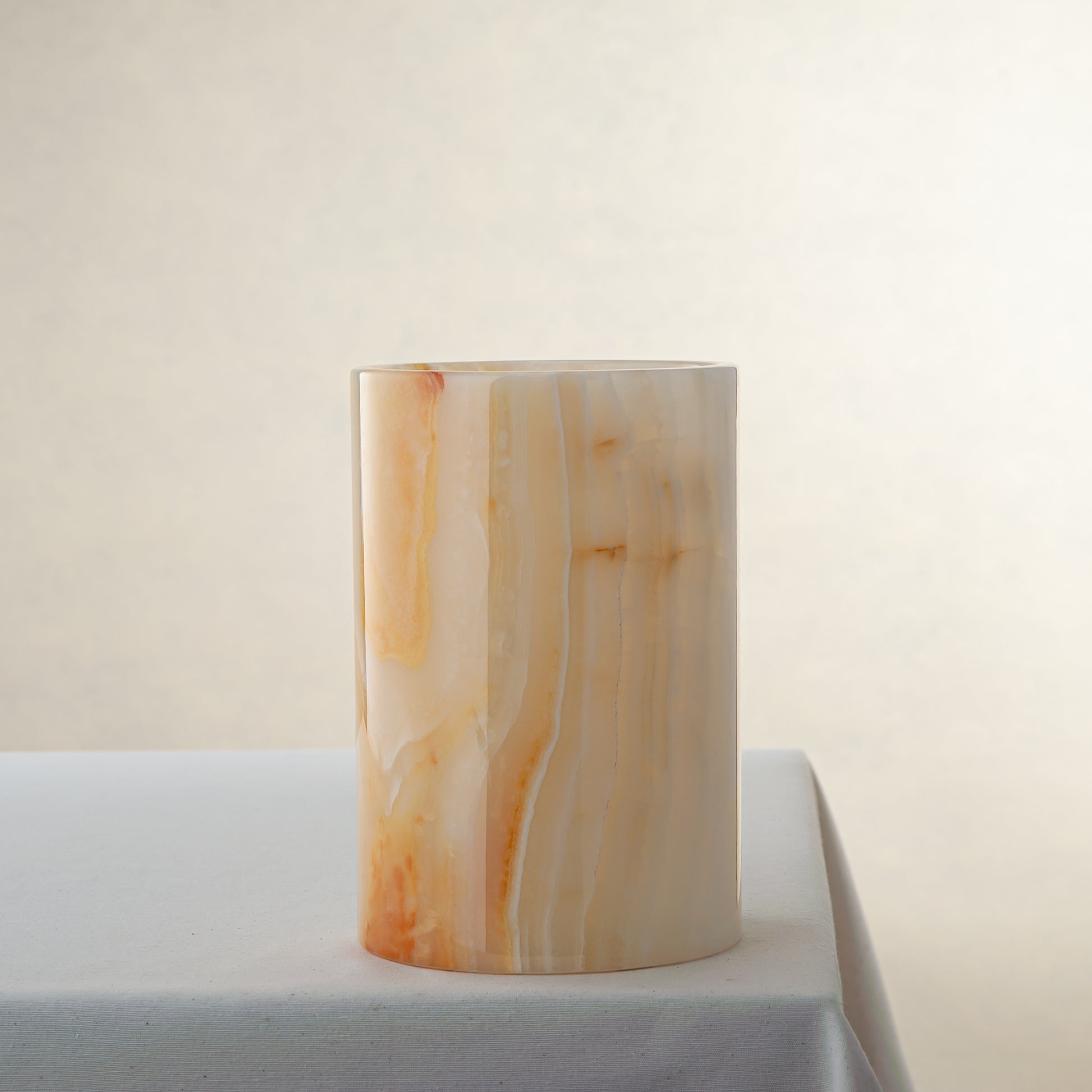 handcrafted onyx vase with honey and amber veining for elegant interior decor
