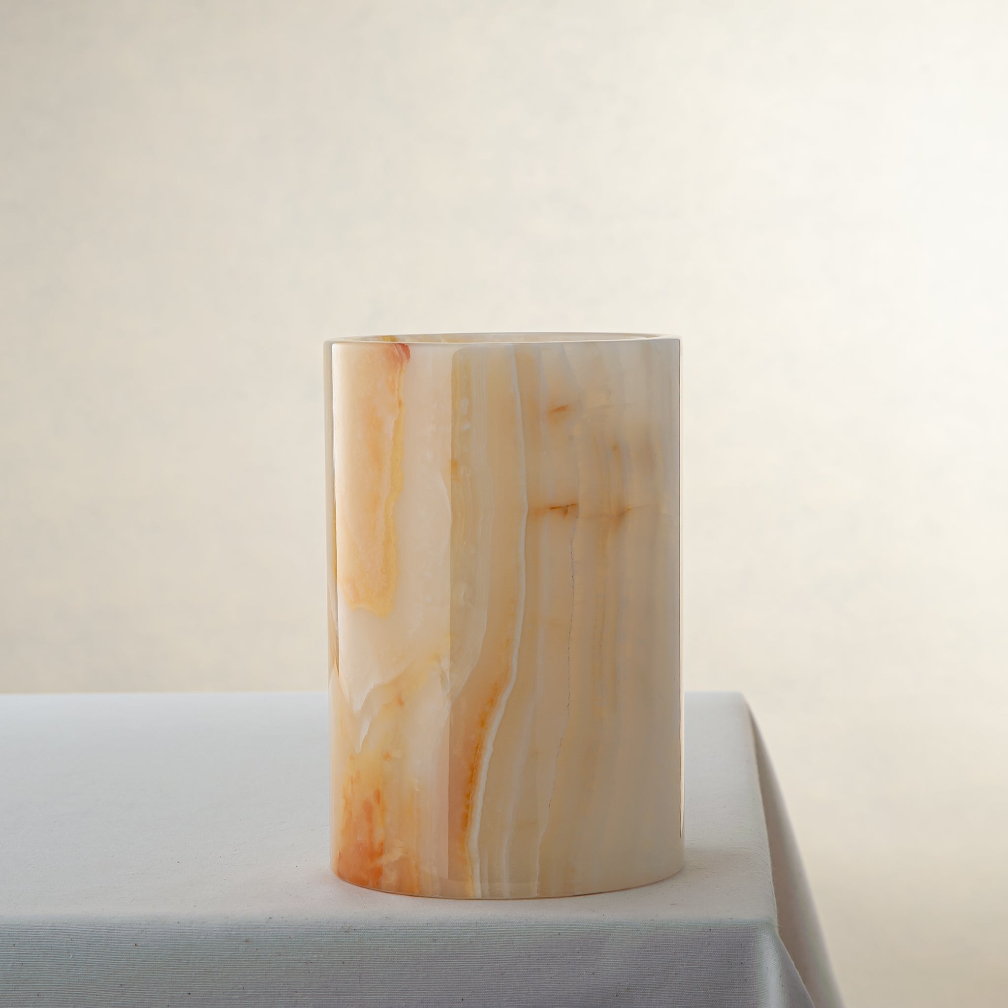 handcrafted onyx vase with honey and amber veining for elegant interior decor
