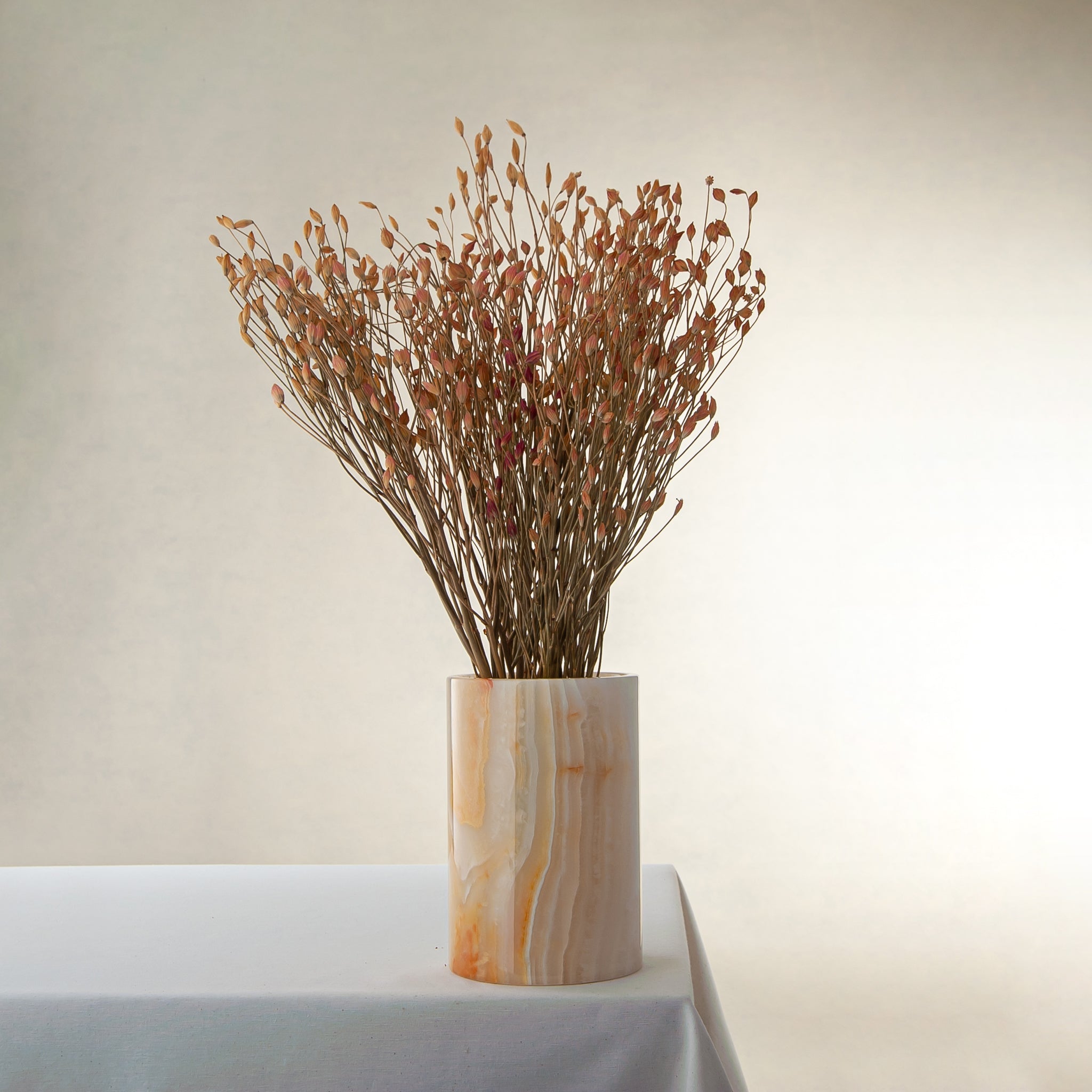 handcrafted onyx vase with honey and amber veining for elegant interior decor
