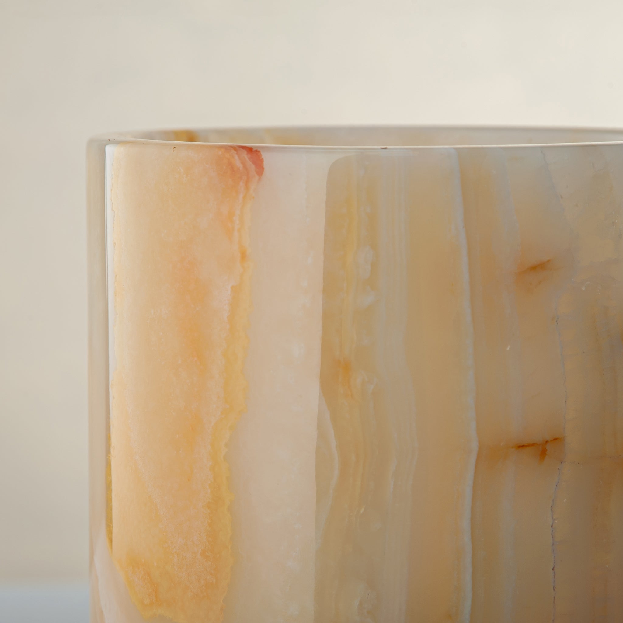 handcrafted onyx vase with honey and amber veining for elegant interior decor
