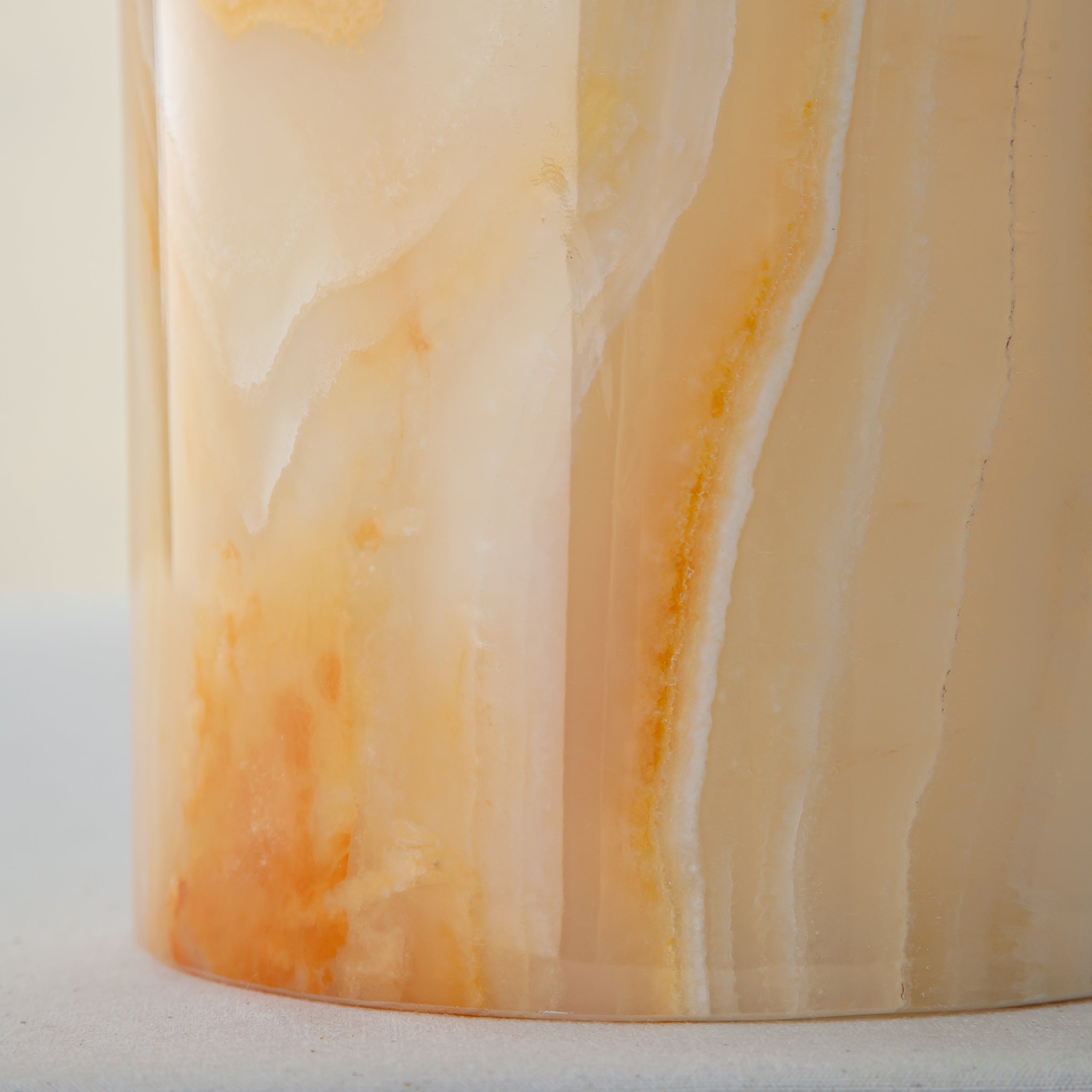 handcrafted onyx vase with honey and amber veining for elegant interior decor

