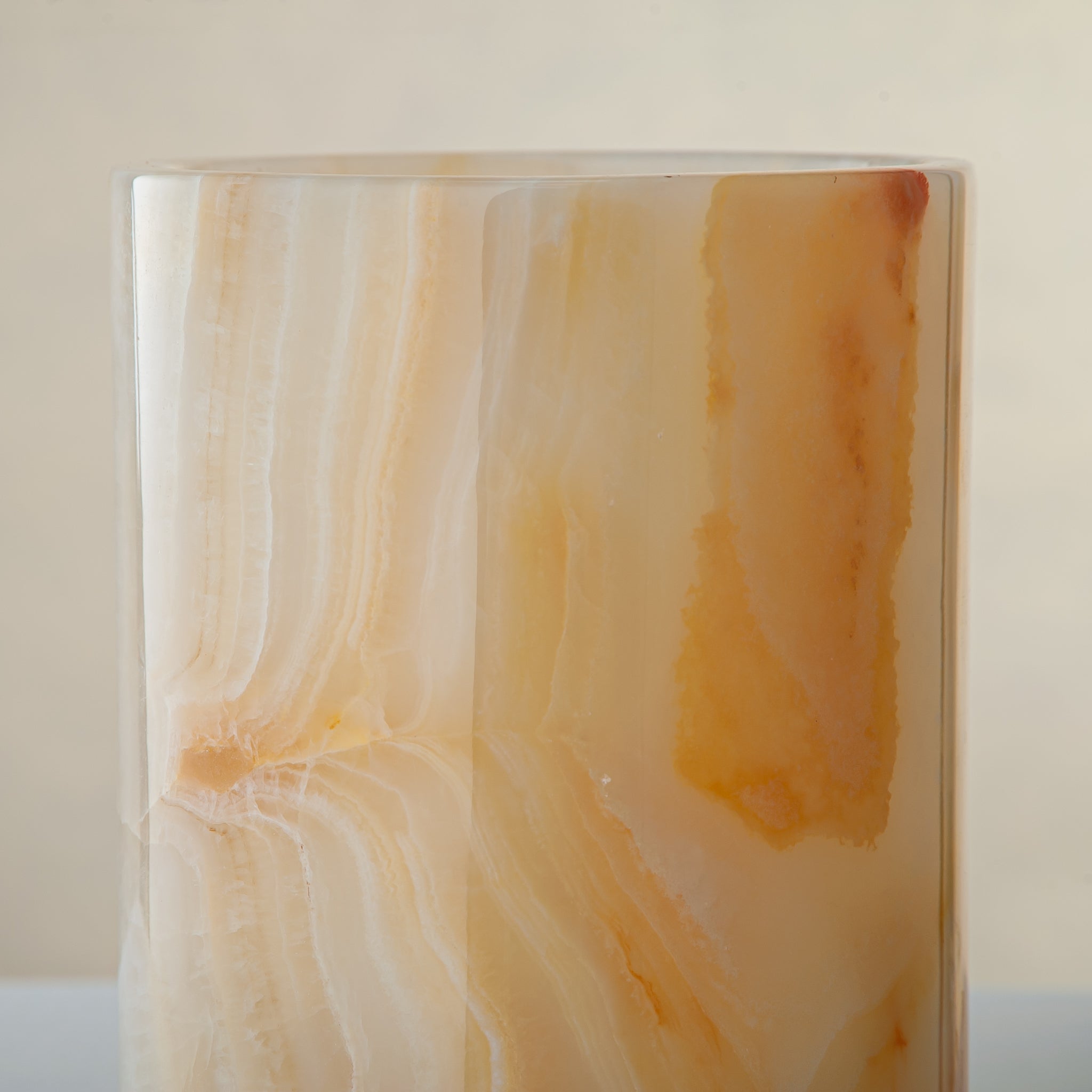handcrafted onyx vase with honey and amber veining for elegant interior decor

