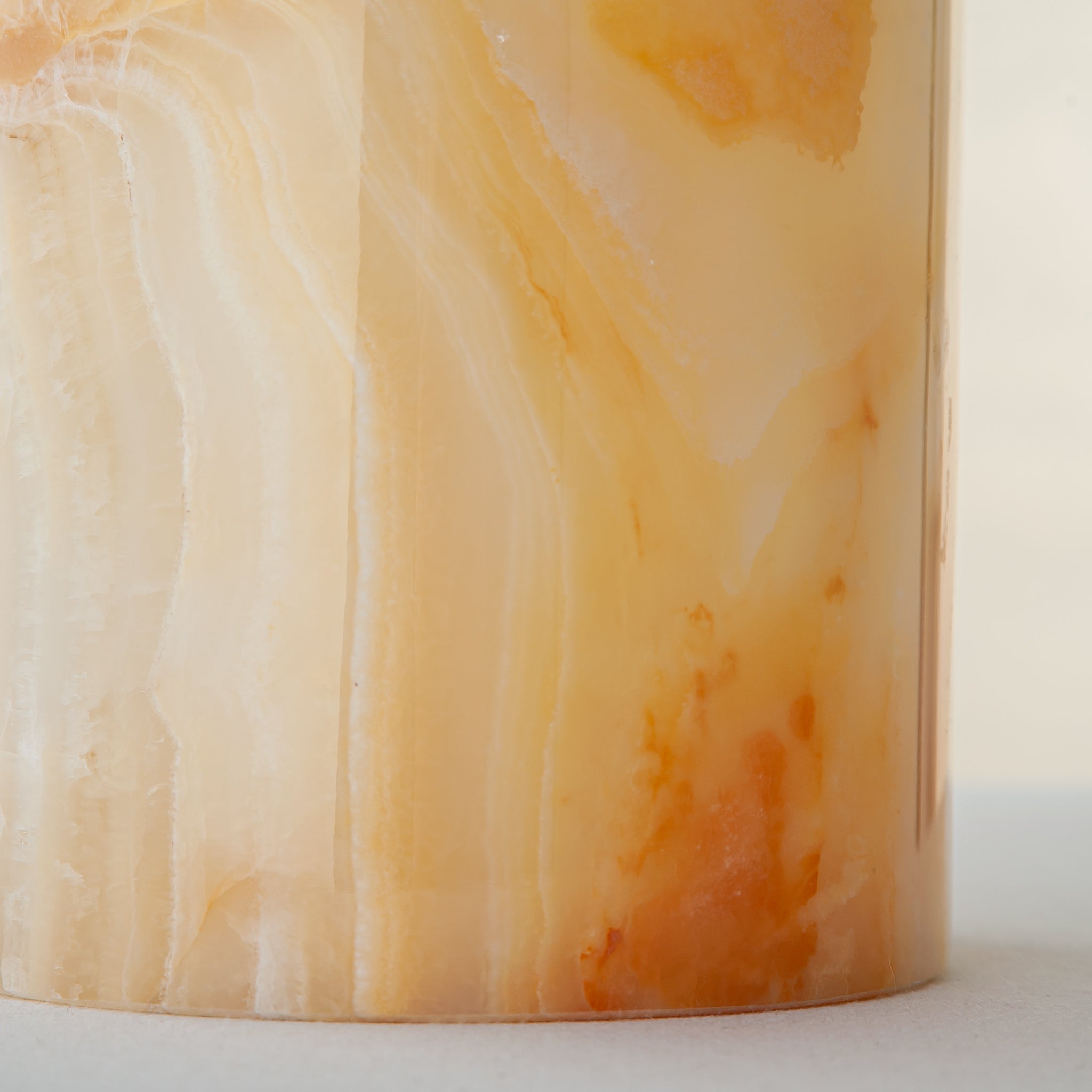 handcrafted onyx vase with honey and amber veining for elegant interior decor
