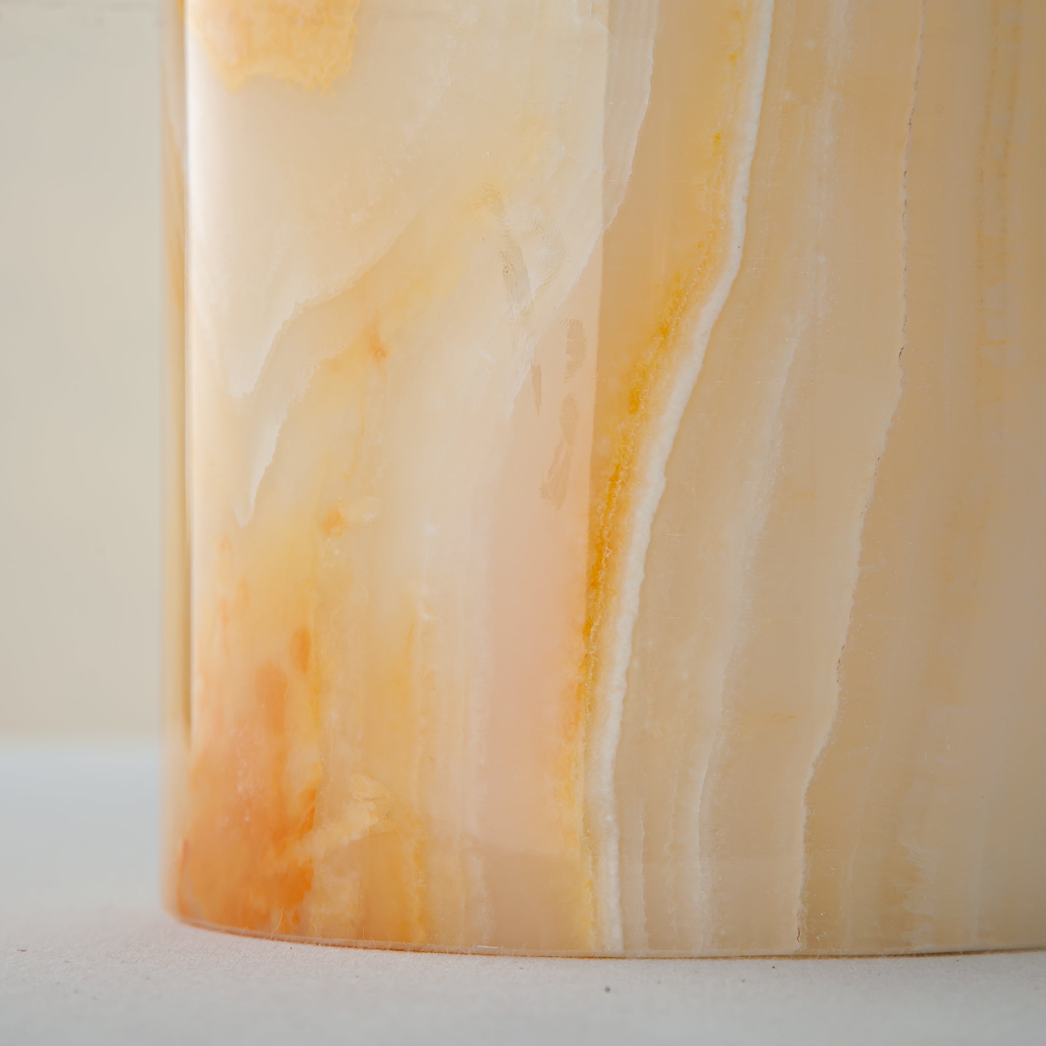 handcrafted onyx vase with honey and amber veining for elegant interior decor
