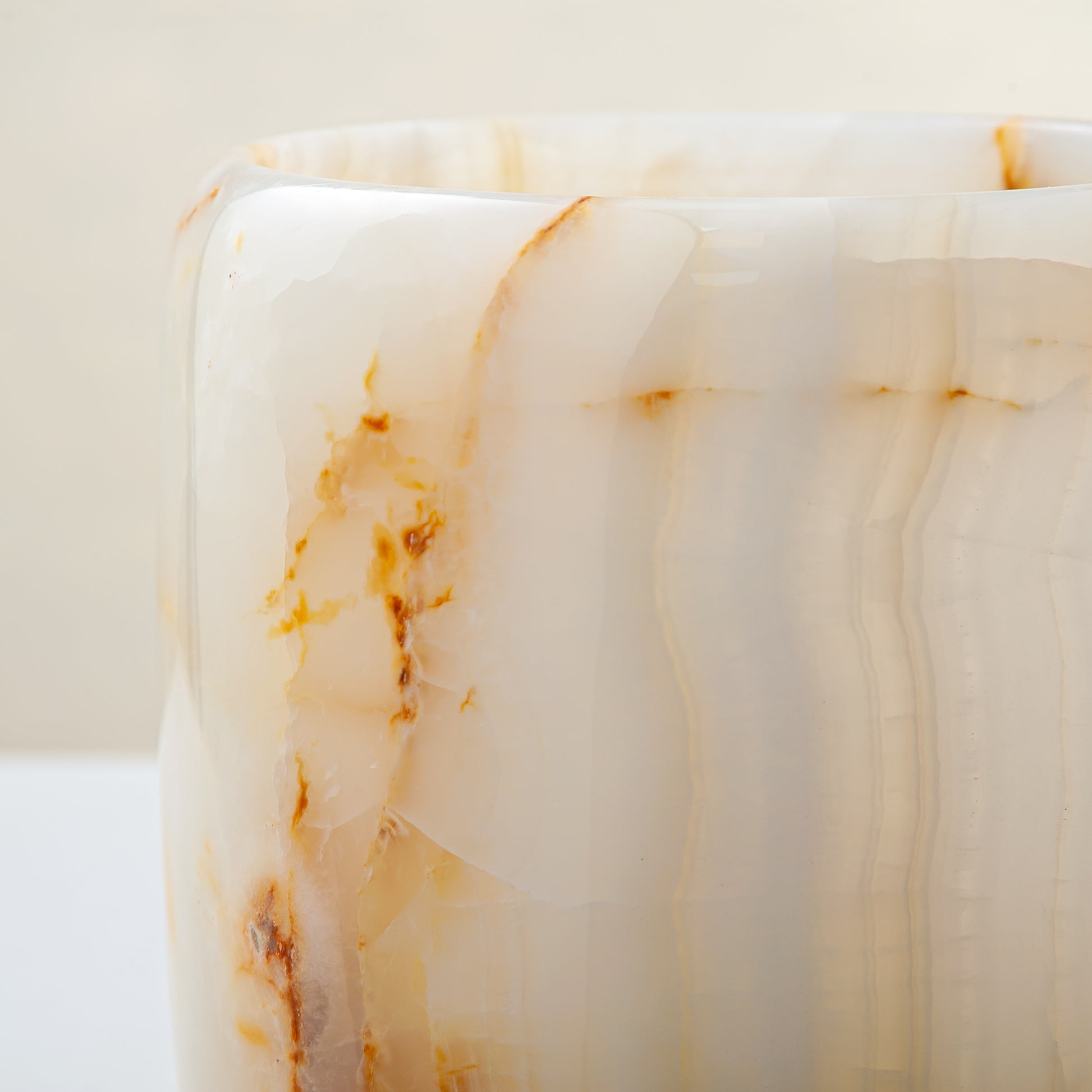 handcrafted onyx vase with ivory tones and soft honey veining for modern decor
