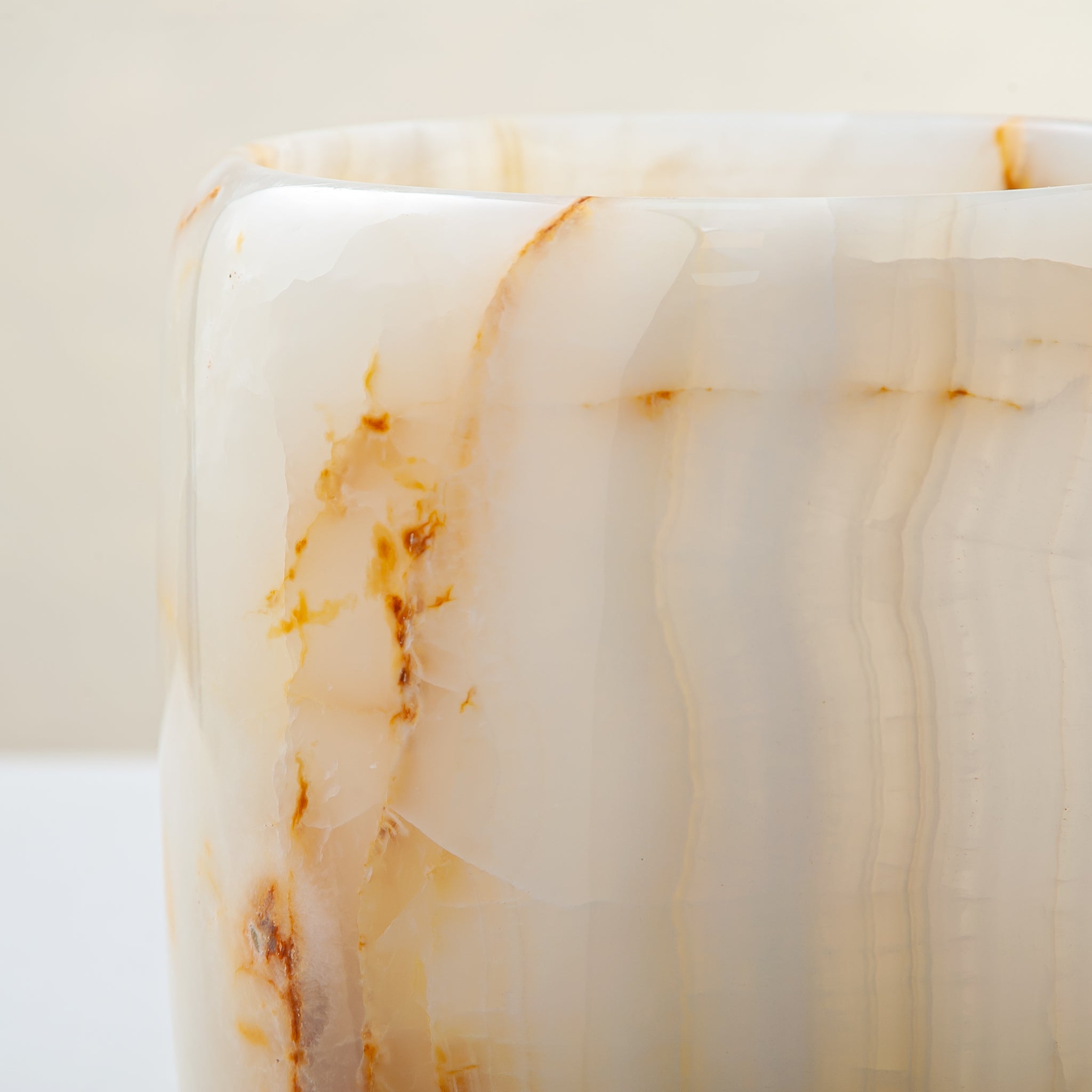 handcrafted onyx vase with ivory tones and soft honey veining for modern decor
