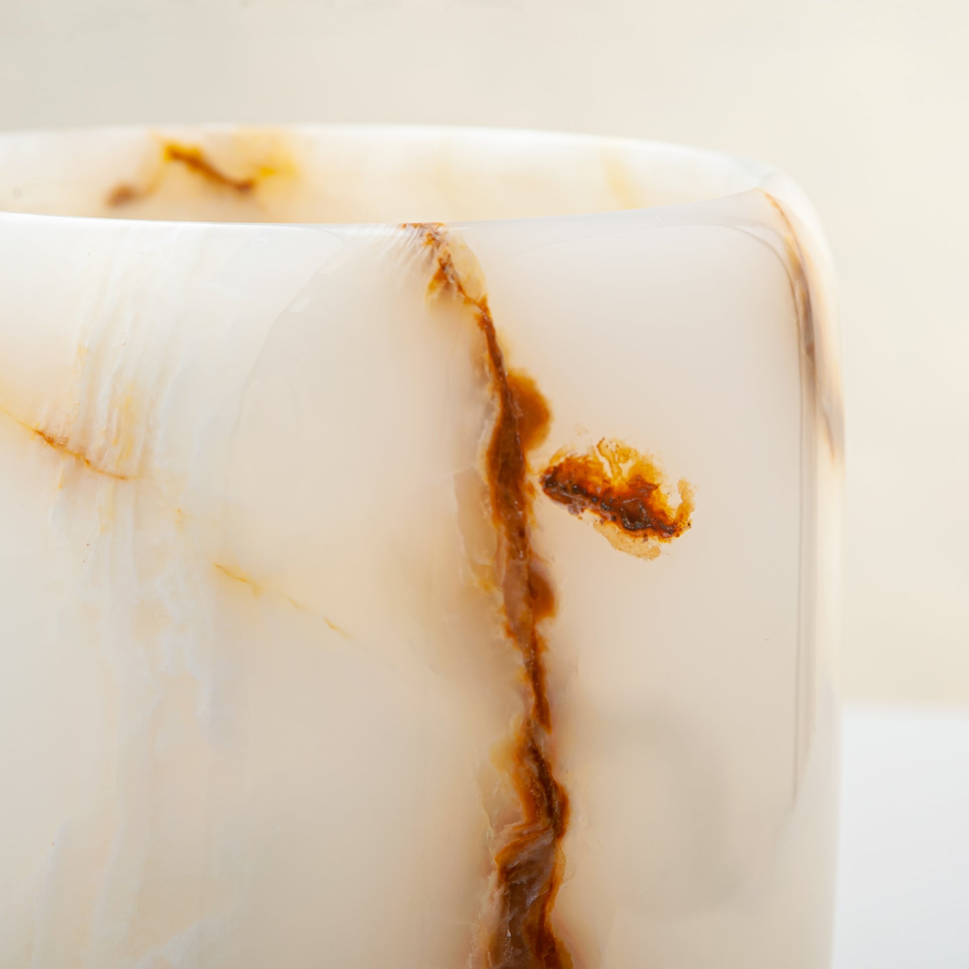 handcrafted onyx vase with ivory tones and soft honey veining for modern decor

