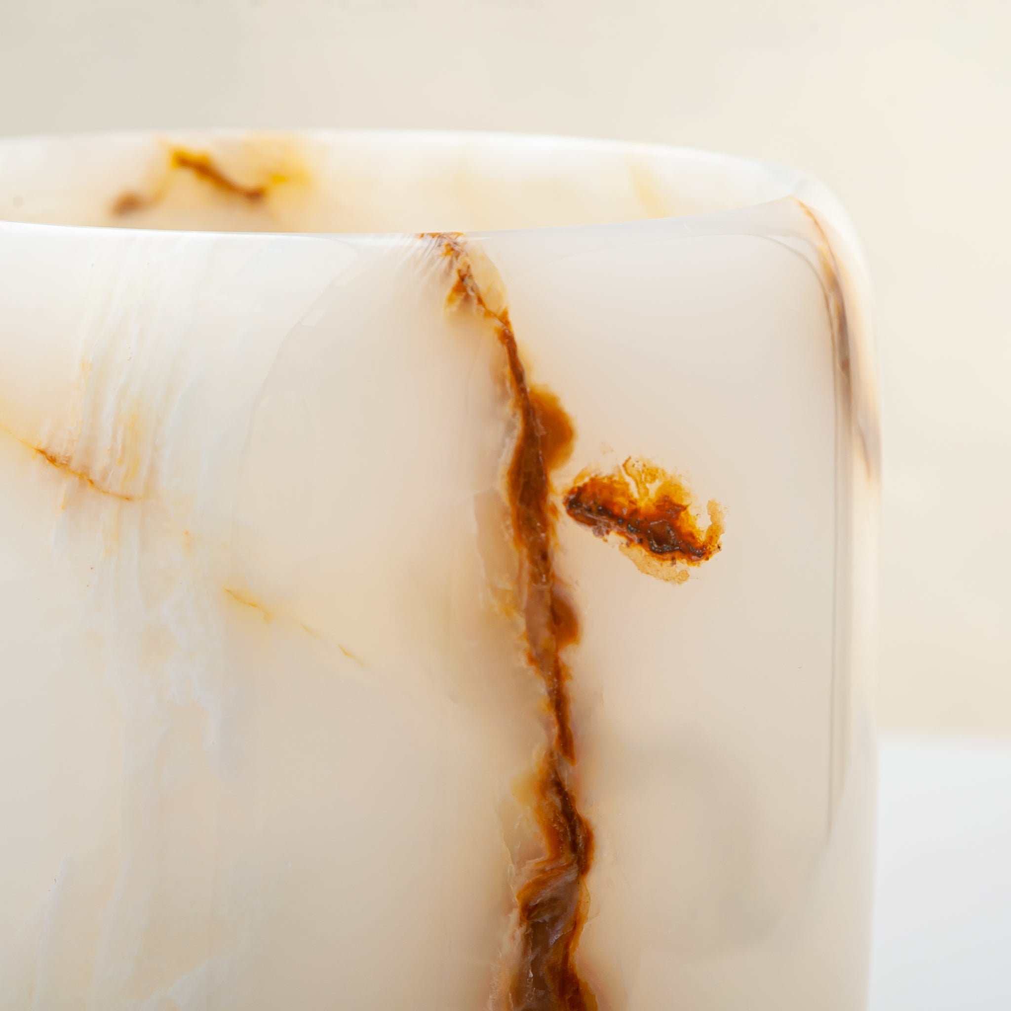 handcrafted onyx vase with ivory tones and soft honey veining for modern decor
