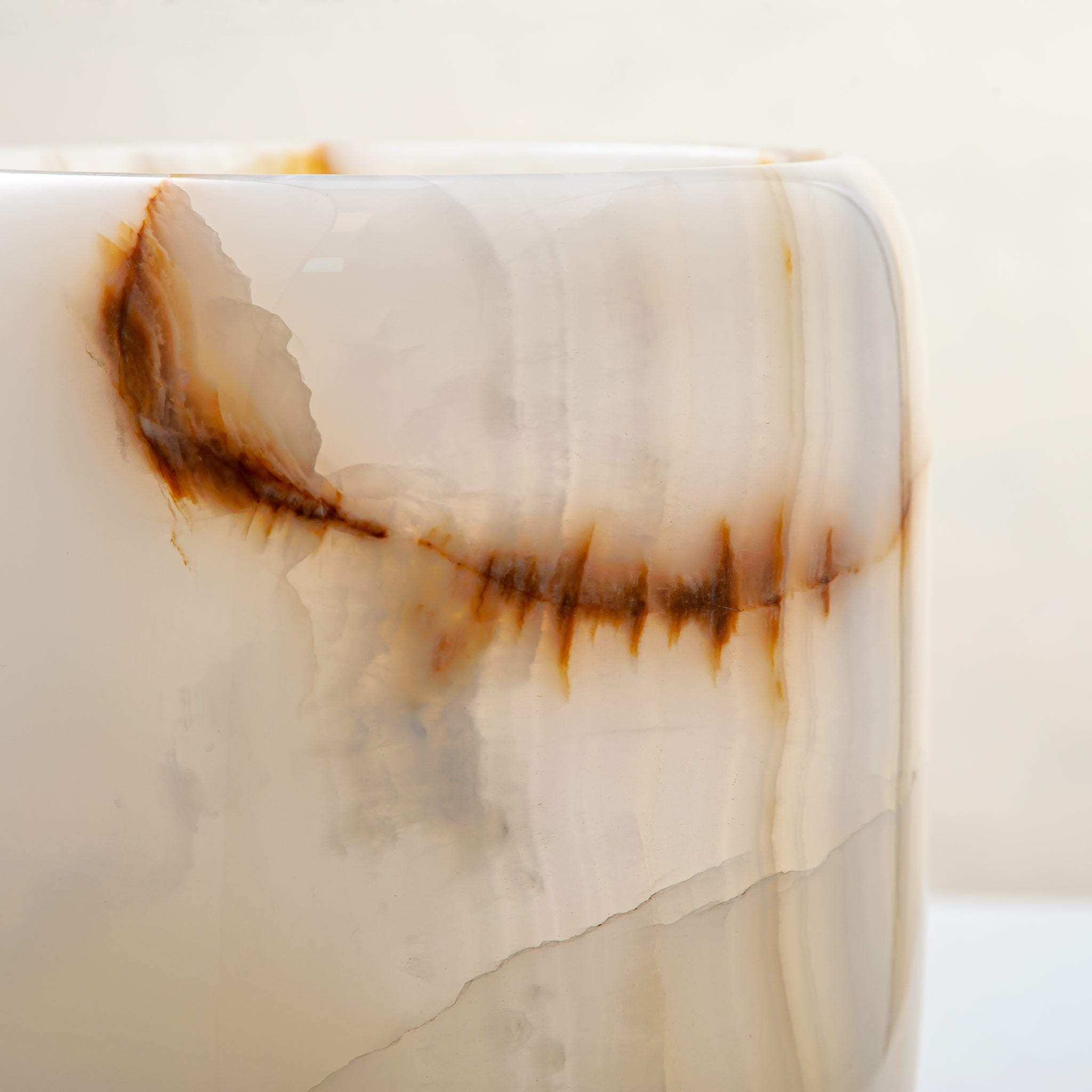 handcrafted onyx vase with ivory tones and soft honey veining for modern decor
