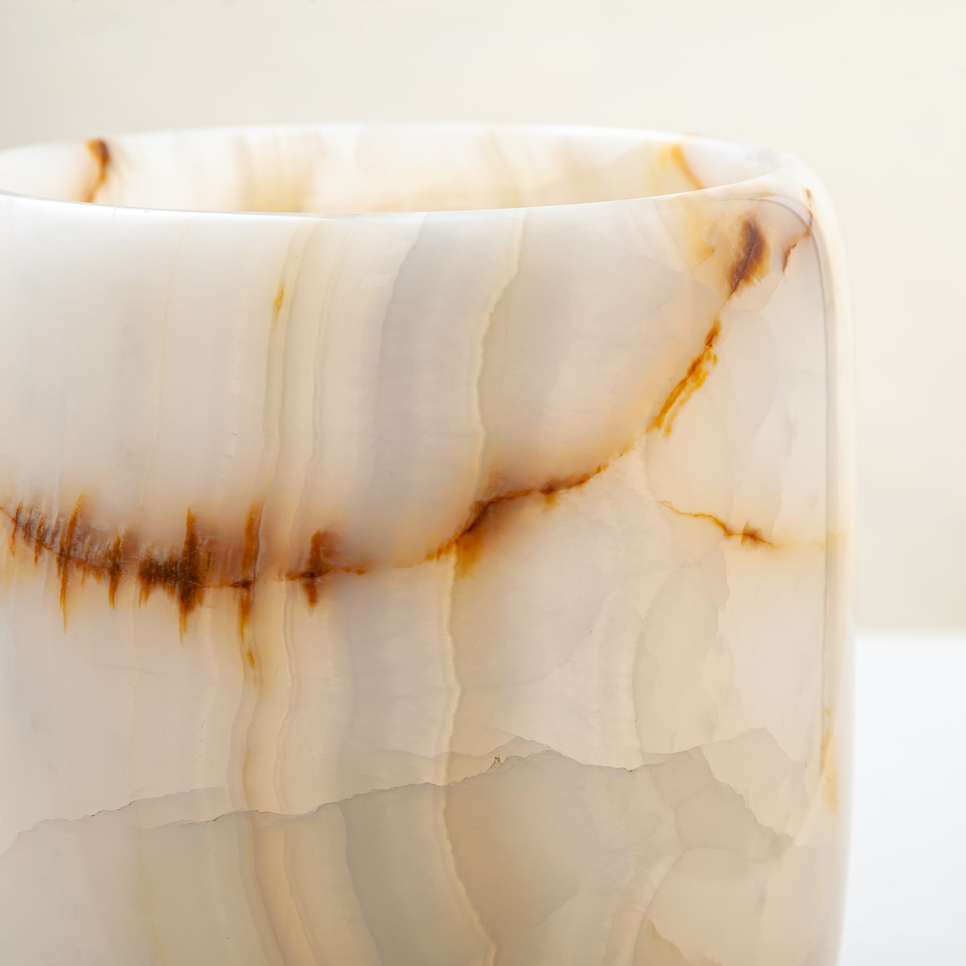 handcrafted onyx vase with ivory tones and soft honey veining for modern decor
