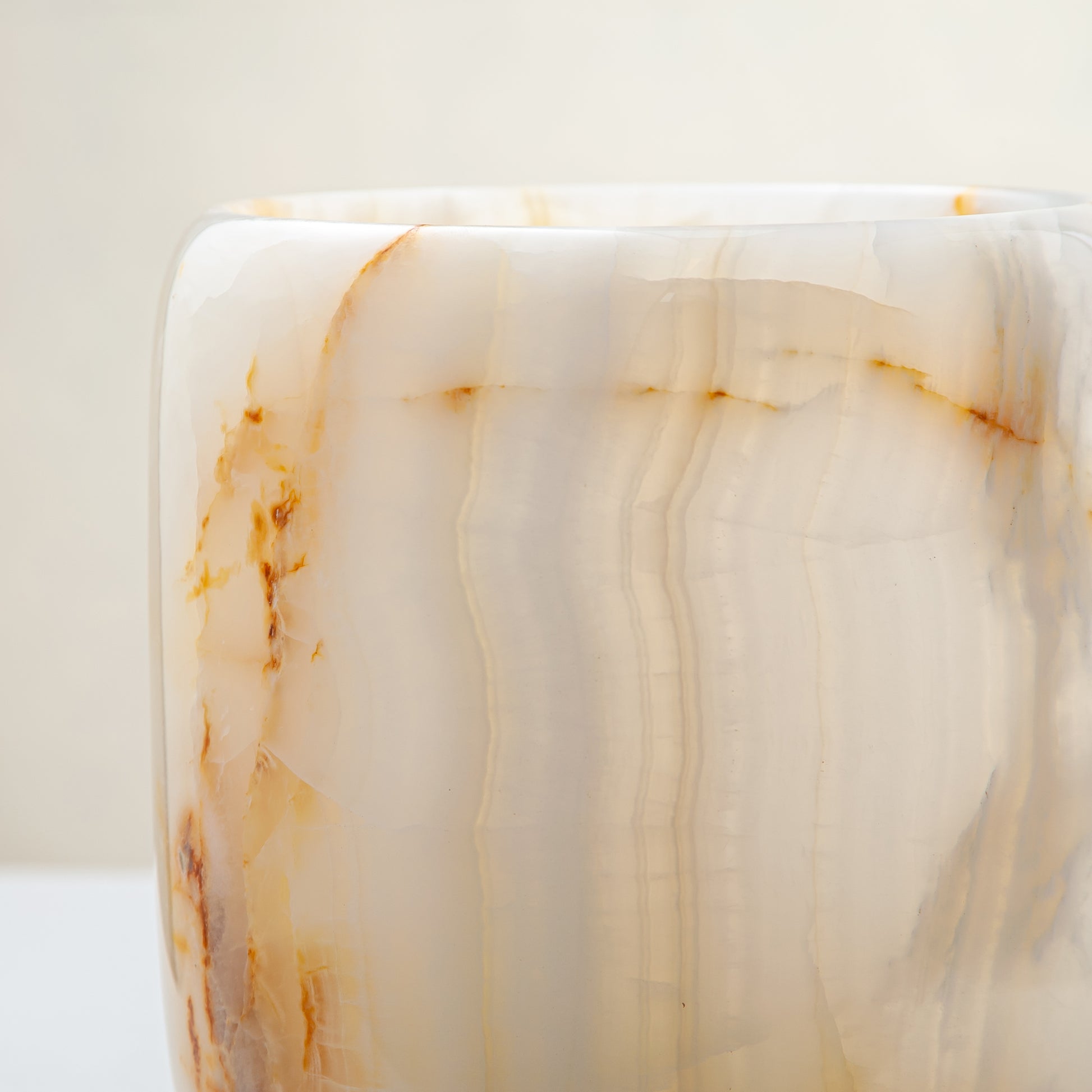 handcrafted onyx vase with ivory tones and soft honey veining for modern decor
