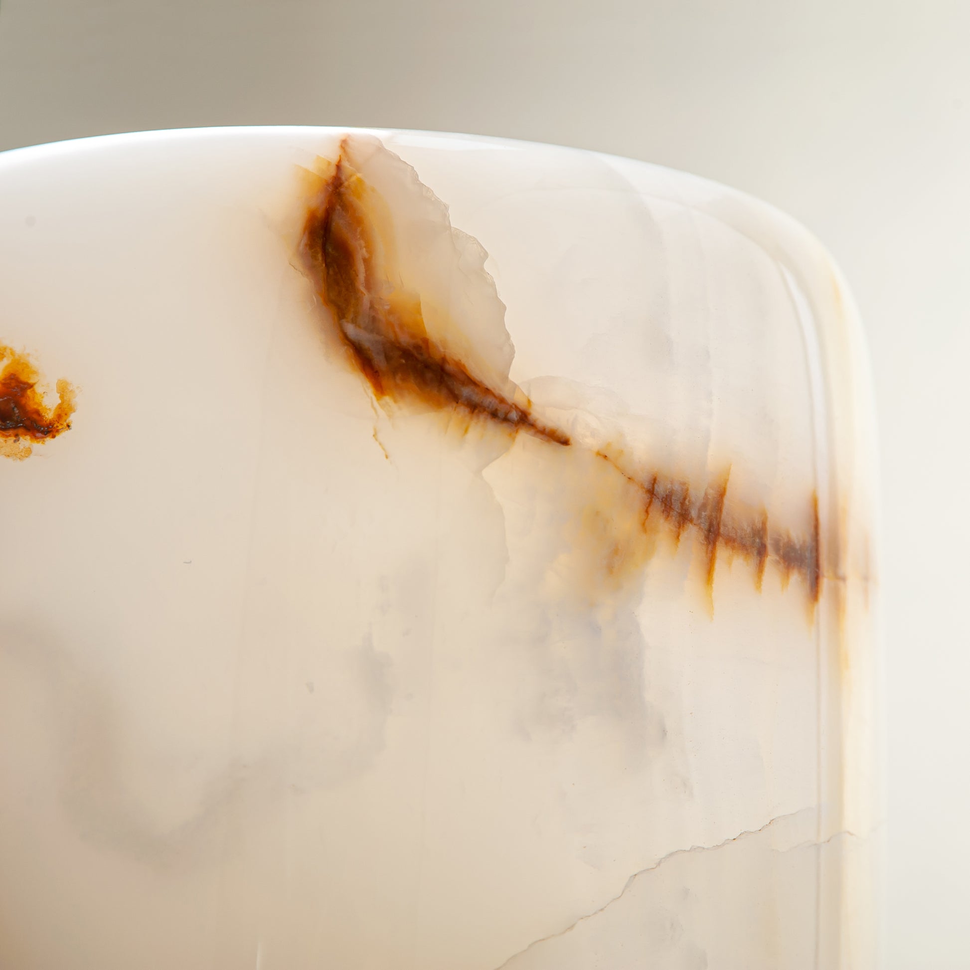 handcrafted onyx vase with ivory tones and soft honey veining for modern decor
