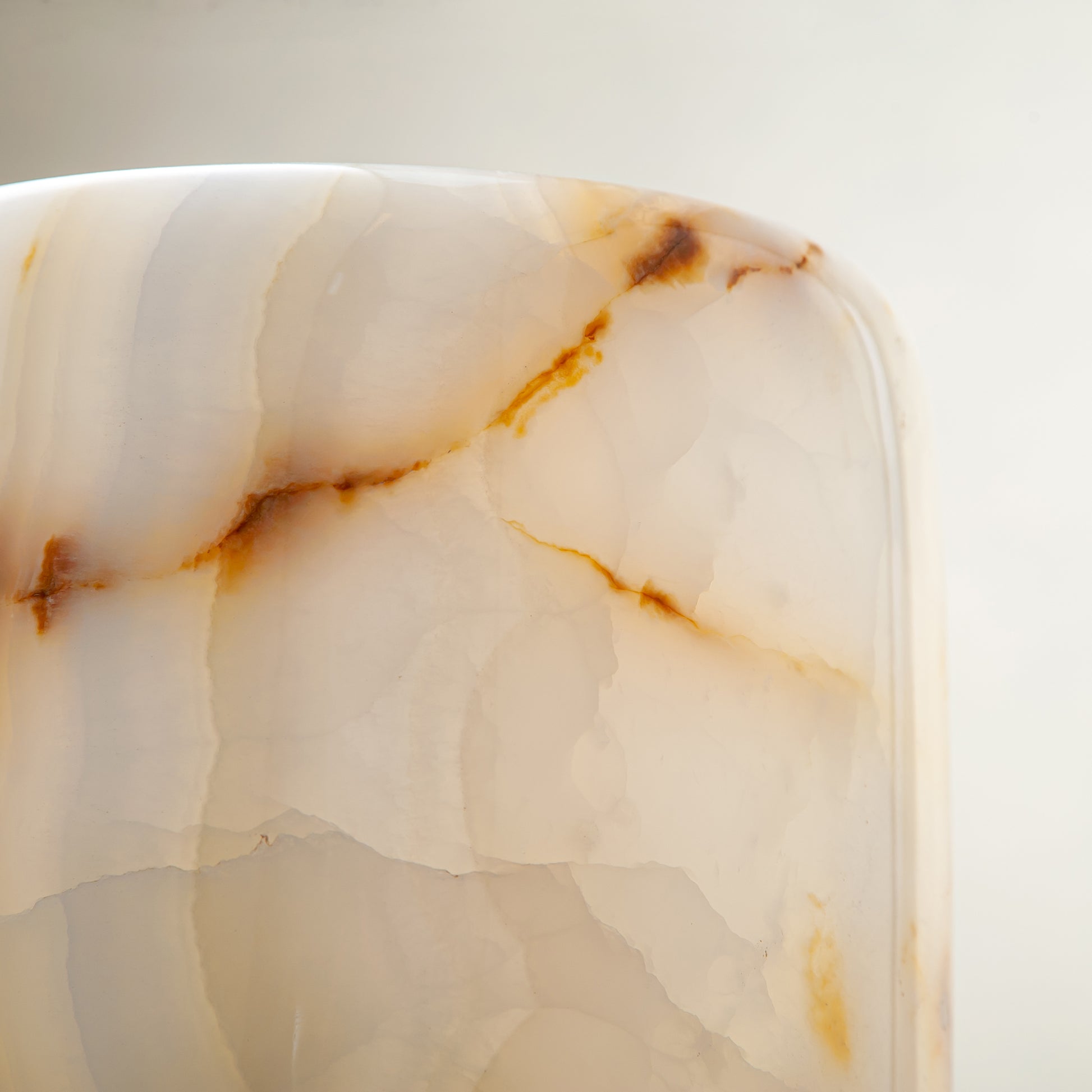 handcrafted onyx vase with ivory tones and soft honey veining for modern decor
